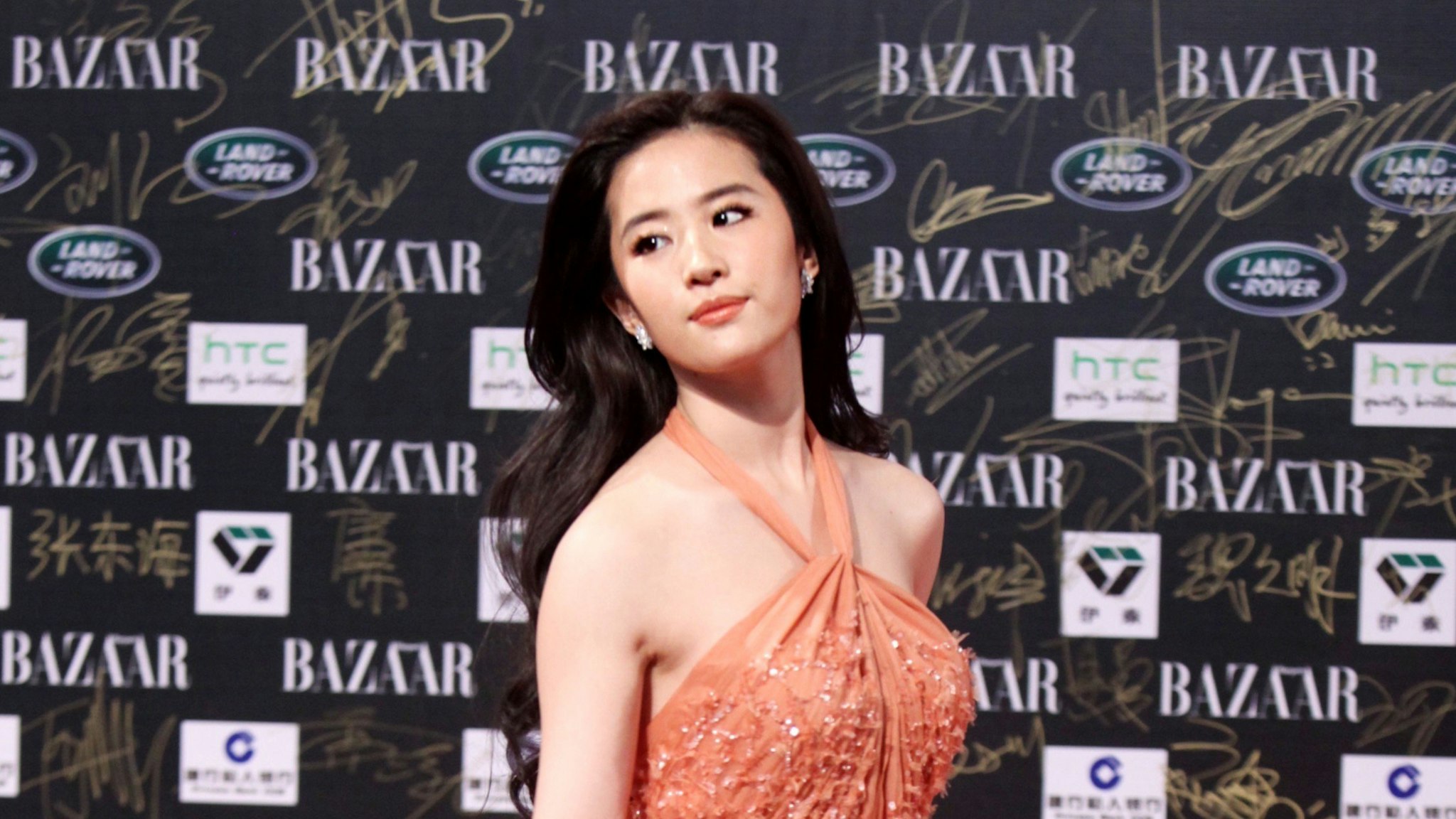 Chinese actress Liu Yifei attends the 2011 BAZAAR Charity Night at Park Hyatt Beijing Hotel on September 14, 2011 in Beijing, China.
