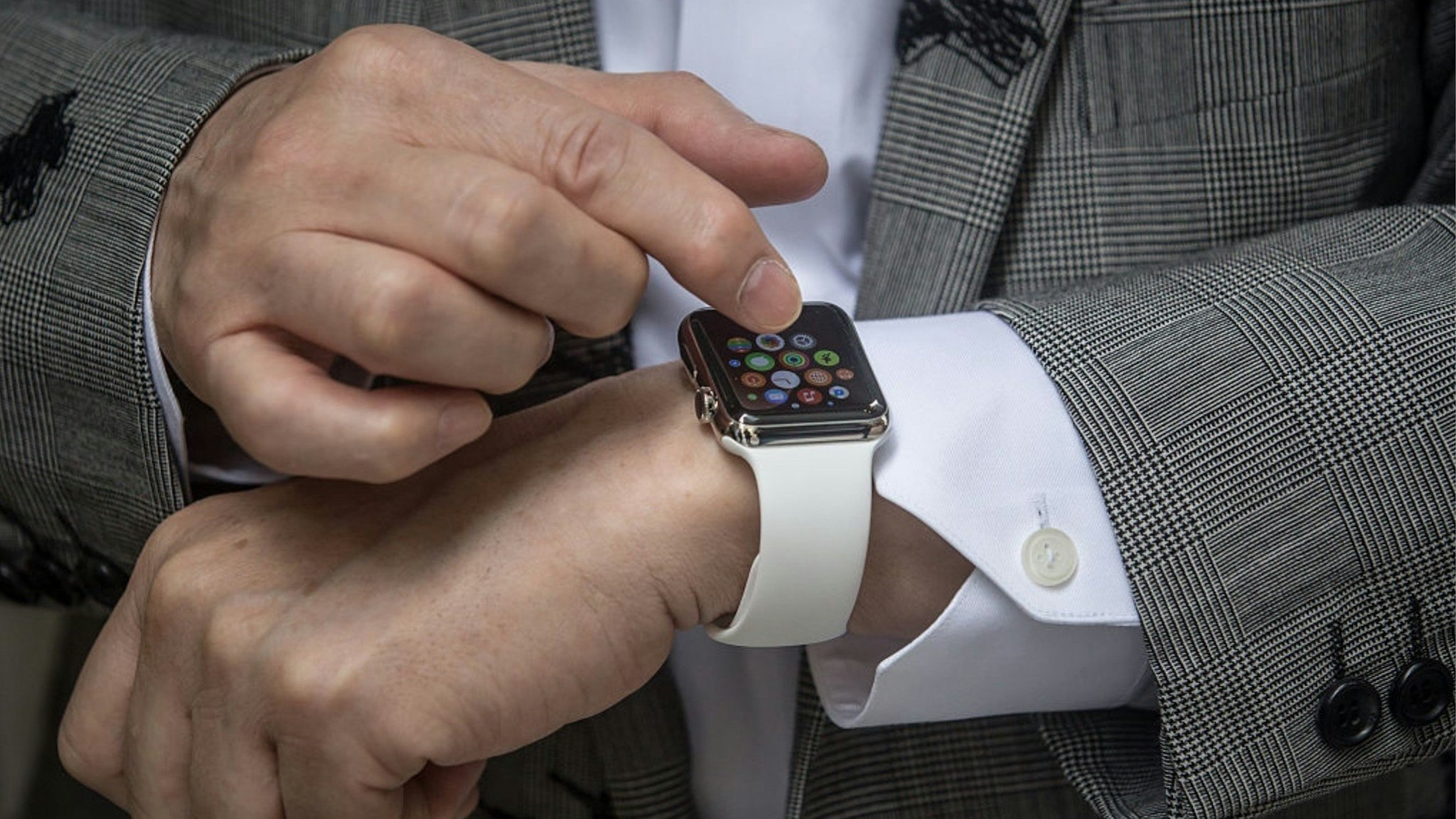 Hajime Shimada shows off his newly purchased Apple Watch outside boutique store, Dover Street Market Ginza on April 24, 2015 in Tokyo, Japan.
