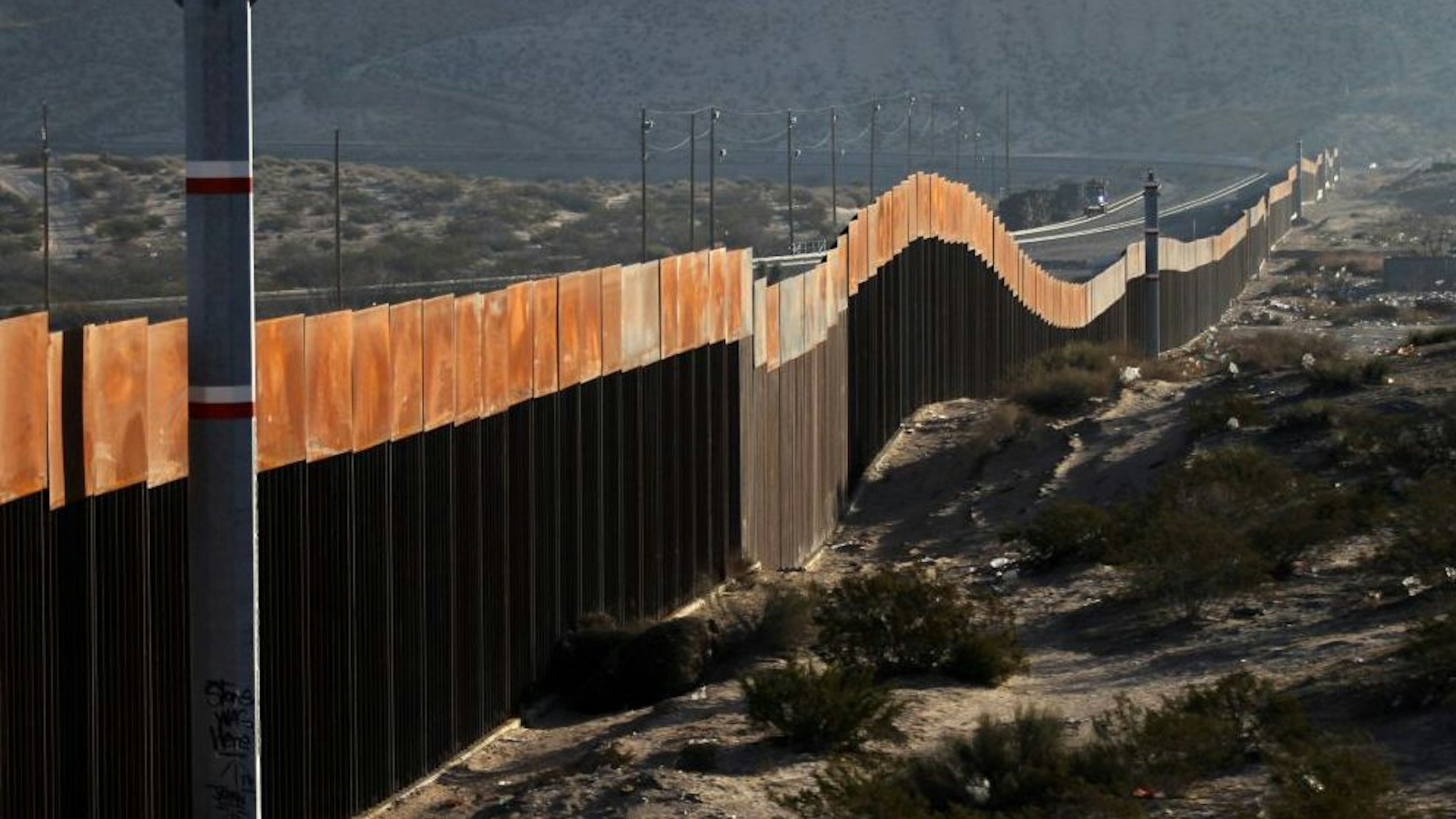A view of the border wall between Mexico and the United States, in Ciudad Juarez, Chihuahua state, Mexico on January 19, 2018. The Mexican government reaffirmed on January 18, 2018 that they will not pay for US President Donald Trump's controversial border wall and warned that the violence in Mexico is also the result of the heavy drug consumption in the United States.
