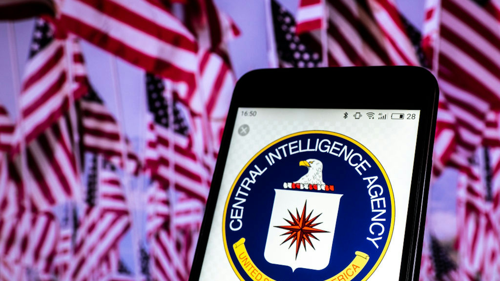 In this photo illustration, the Seal of United States Central Intelligence Agency seen displayed on a smartphone