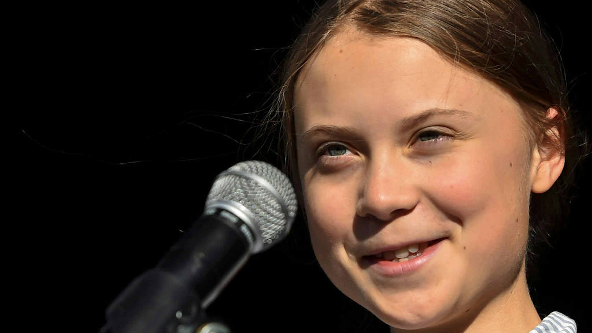 Swedish climate activist Greta Thunberg takes to the podium to address young activists and their supporters during the rally for action on climate change on September 27, 2019 in Montreal, Canada.
