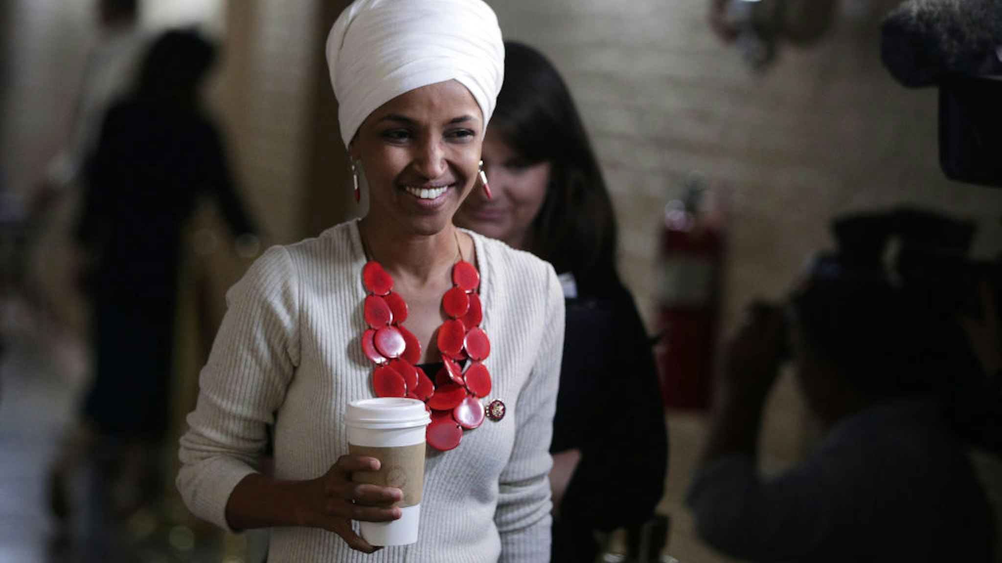 Rep. Ilhan Omar arrives at a House Democratic Caucus meeting at the U.S. Capitol September 25, 2019