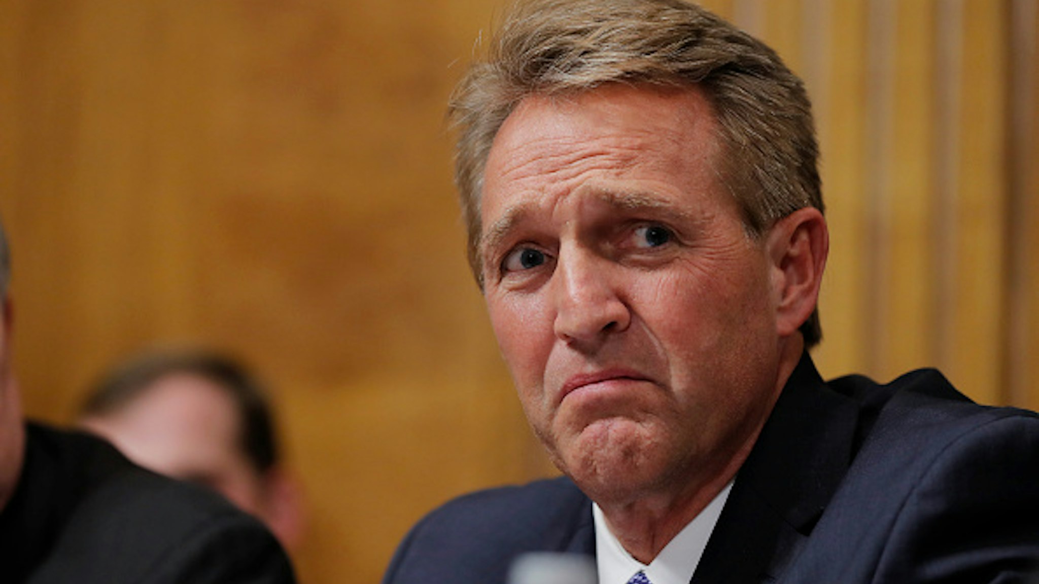 WASHINGTON D.C. - SEPTEMBER 27: U.S. Senator Jeff Flake (R-AZ) looks on during Judge Brett Kavanaugh's testimony to the Senate Judiciary Committee during his Supreme Court confirmation hearing in the Dirksen Senate Office Building on Capitol Hill September 27, 2018 in Washington, DC. Kavanaugh was called back to testify about claims by Christine Blasey Ford, who has accused him of sexually assaulting her during a party in 1982 when they were high school students in suburban Maryland