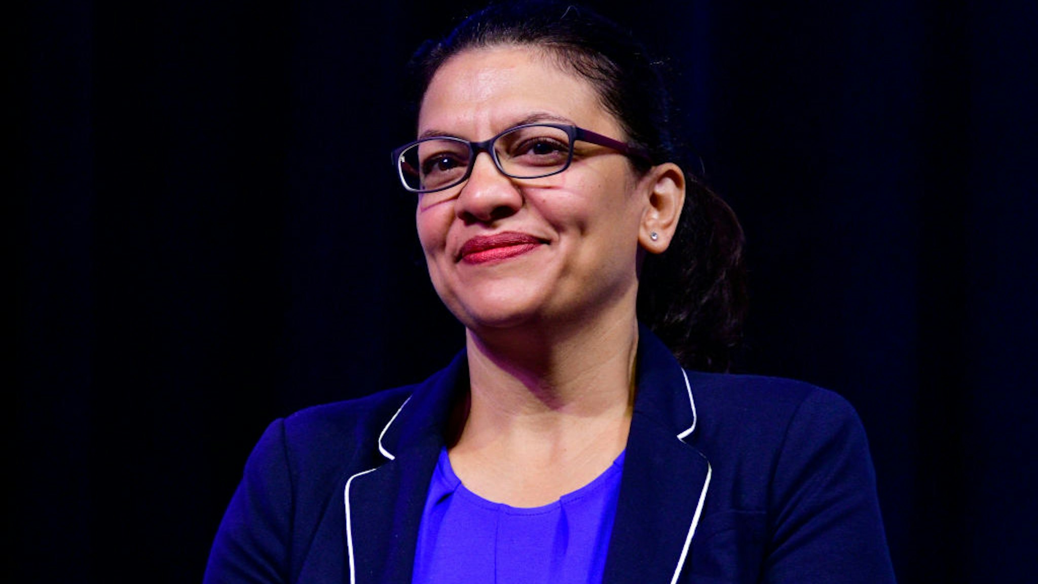 Rep. Rashida Tlaib (D-MI) takes part in a panel discussion led by Aimee Allison