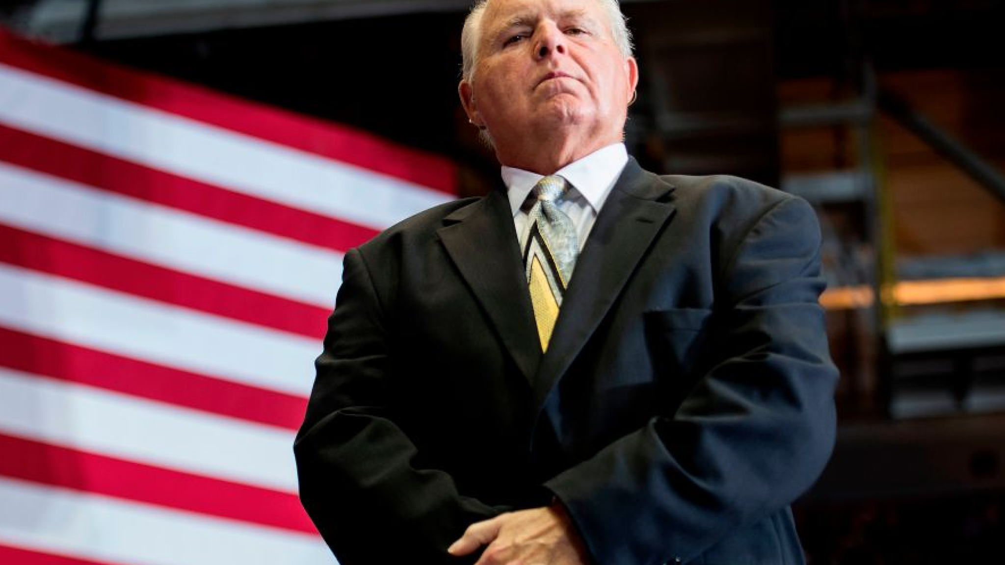 US radio talk show host and conservative political commentator Rush Limbaugh looks on before introducing US President Donald Trump to deliver remarks at a Make America Great Again rally in Cape Girardeau, MO, on November 5, 2018.