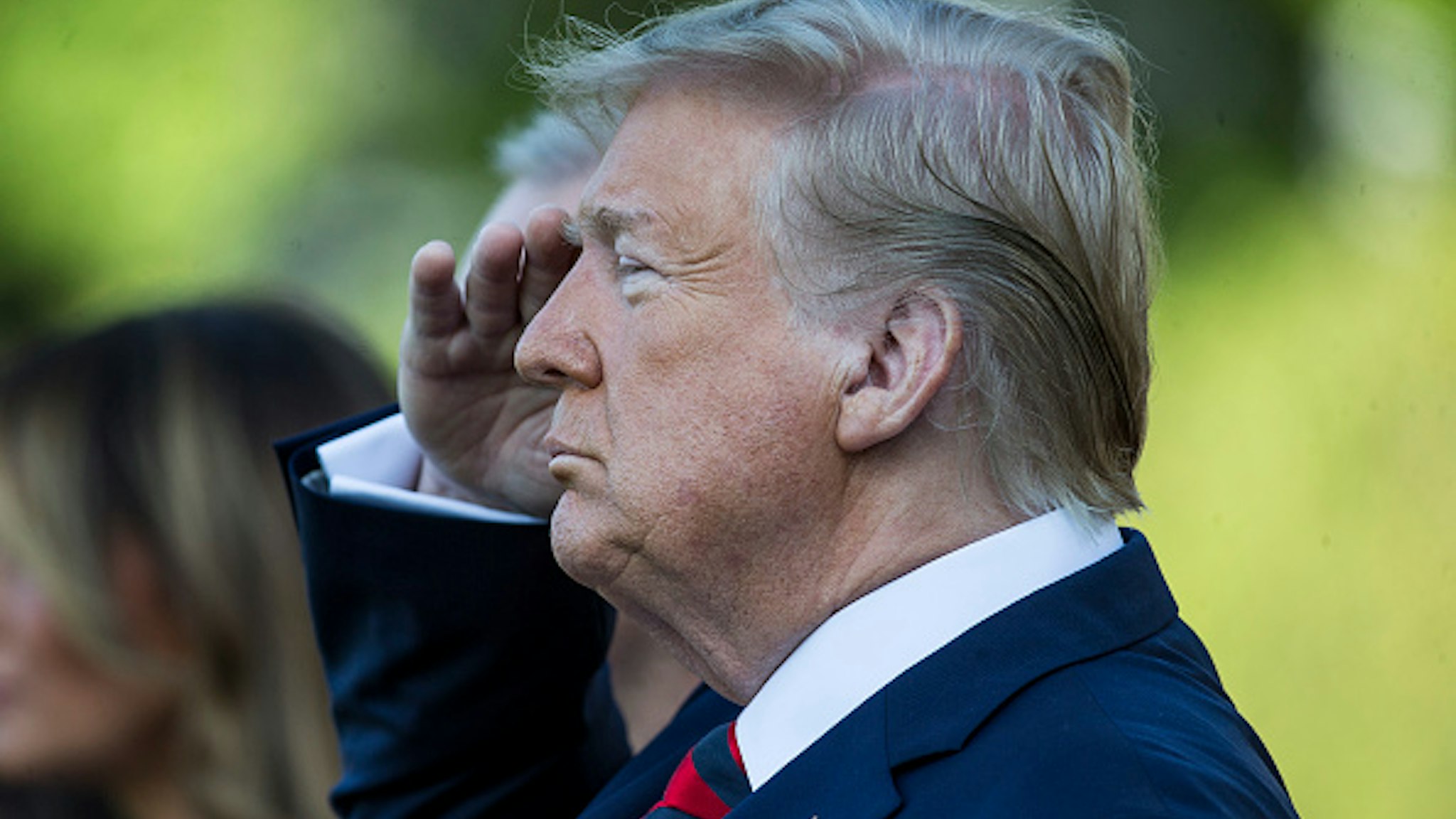 WASHINGTON, DC - SEPTEMBER 20: U.S. President Donald Trump salutes during an official visit ceremony welcoming Australian Prime Minister Scott Morrison and Australian first lady Jennifer Morrison at the South Lawn at the White House September 20, 2019 in Washington, DC.