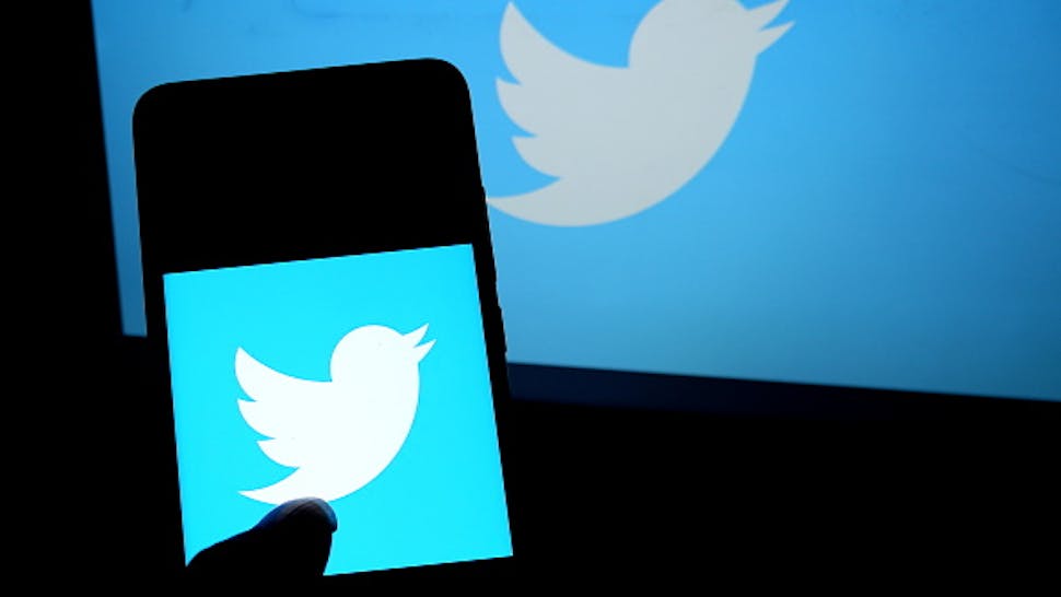 In this photo illustration a popular micro blogging and KOLKATA, INDIA - 2019/07/20: In this photo illustration a popular micro blogging and social networking service Twitter logo seen displayed on a smartphone. (