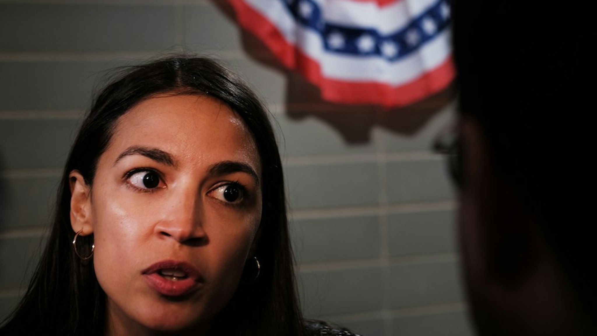 U.S. Rep. Alexandria Ocasio-Cortez (D-NY) speaks to the media after a public housing town hall at a New York City Housing Authority (NYCHA) residence on August 29, 2019 in the Bronx borough of New York City.