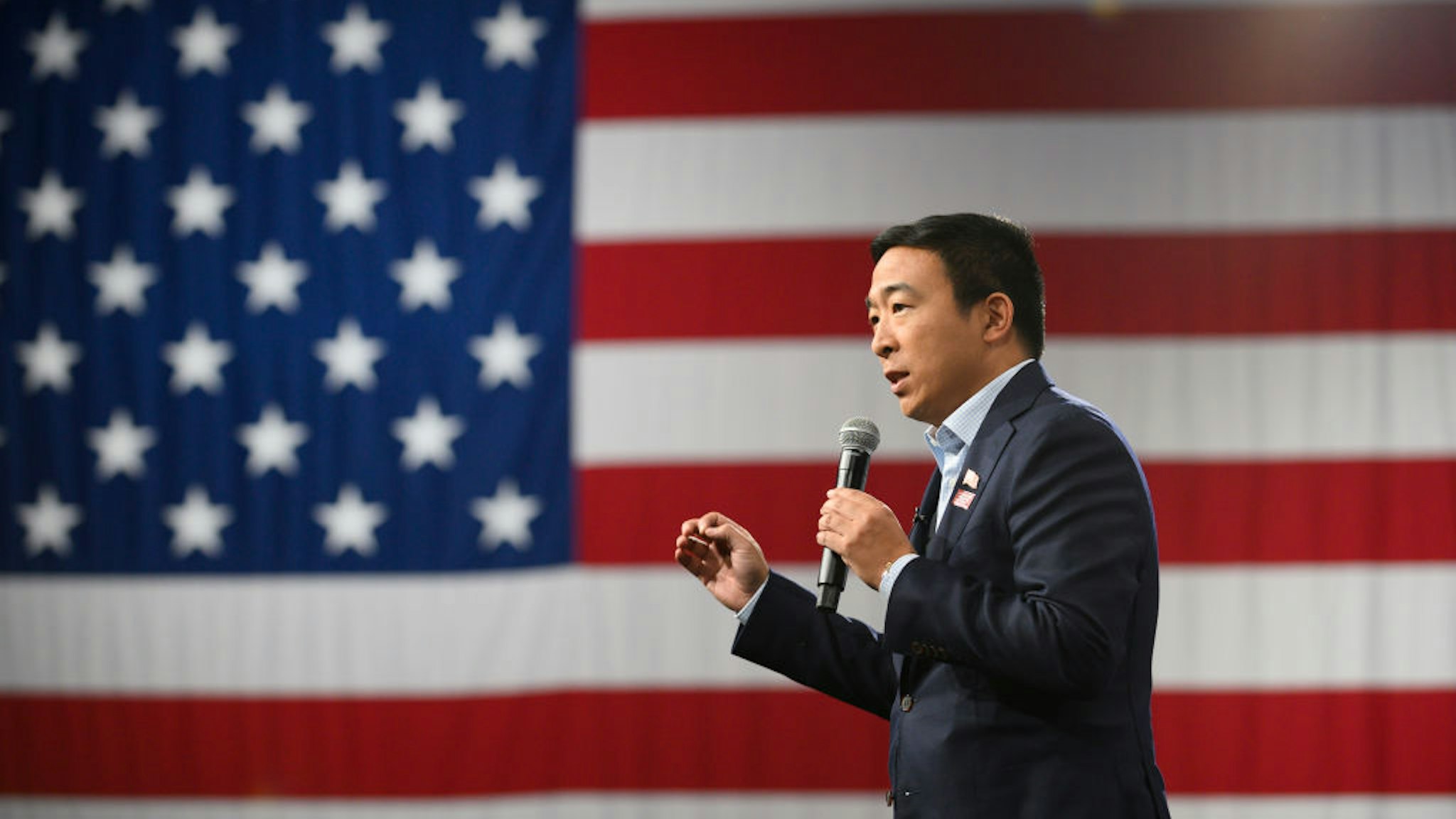 Andrew Yang speaks during a forum on gun safety at the Iowa Events Center