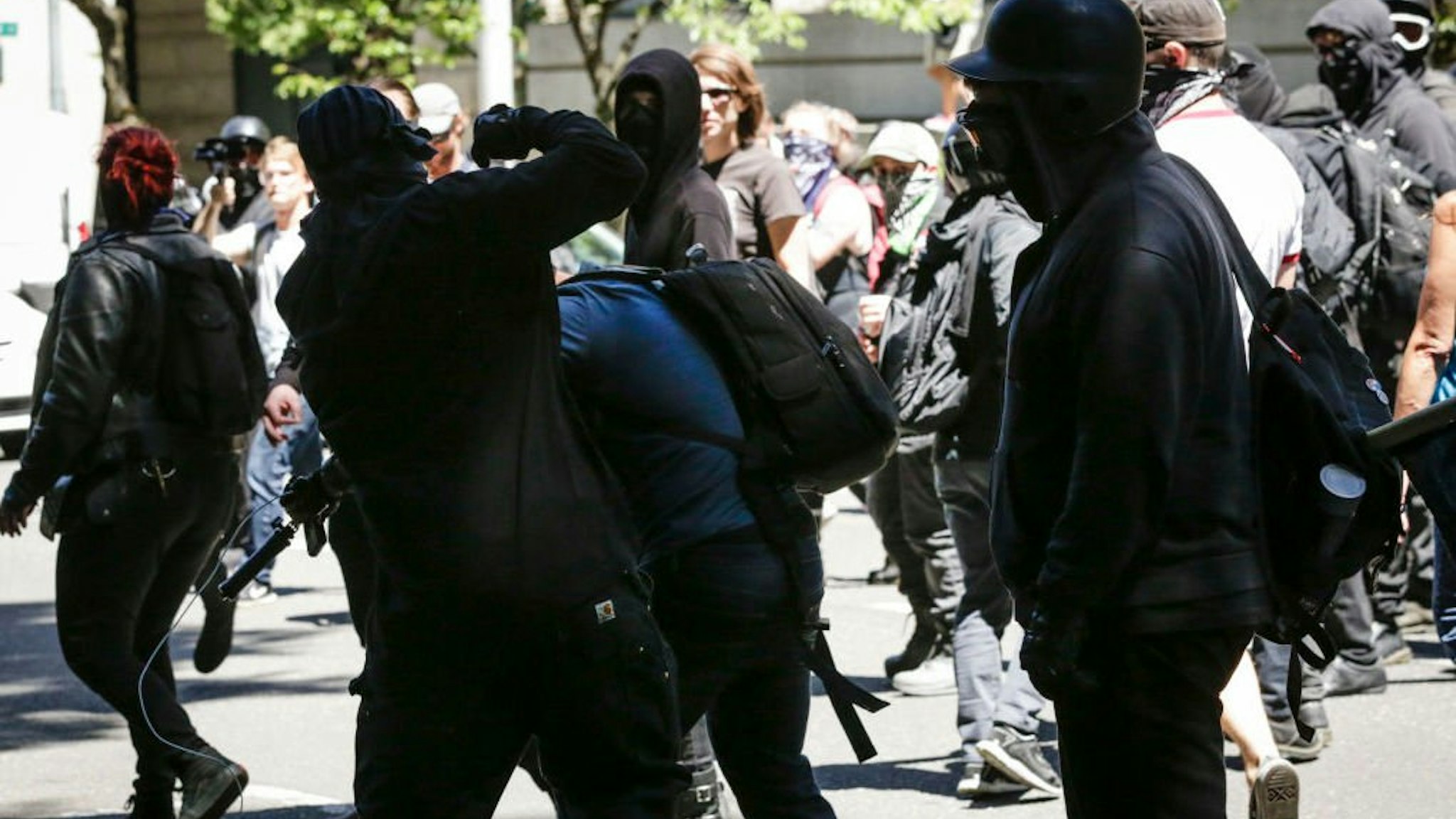 Unidentified Rose City Antifa members beat up Andy Ngo, a Portland-based journalist, on June 29, 2019 in Portland, Oregon.