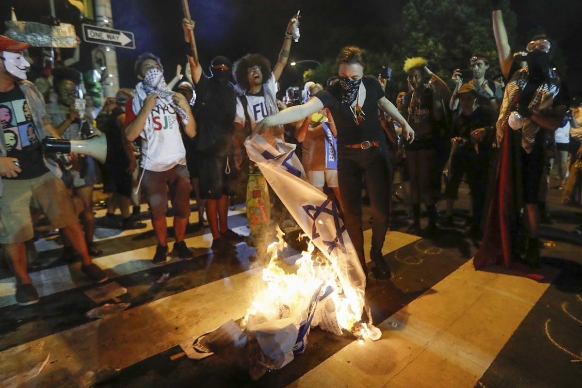 WATCH: Israeli/American Flags Burned By Leftists Outside ...