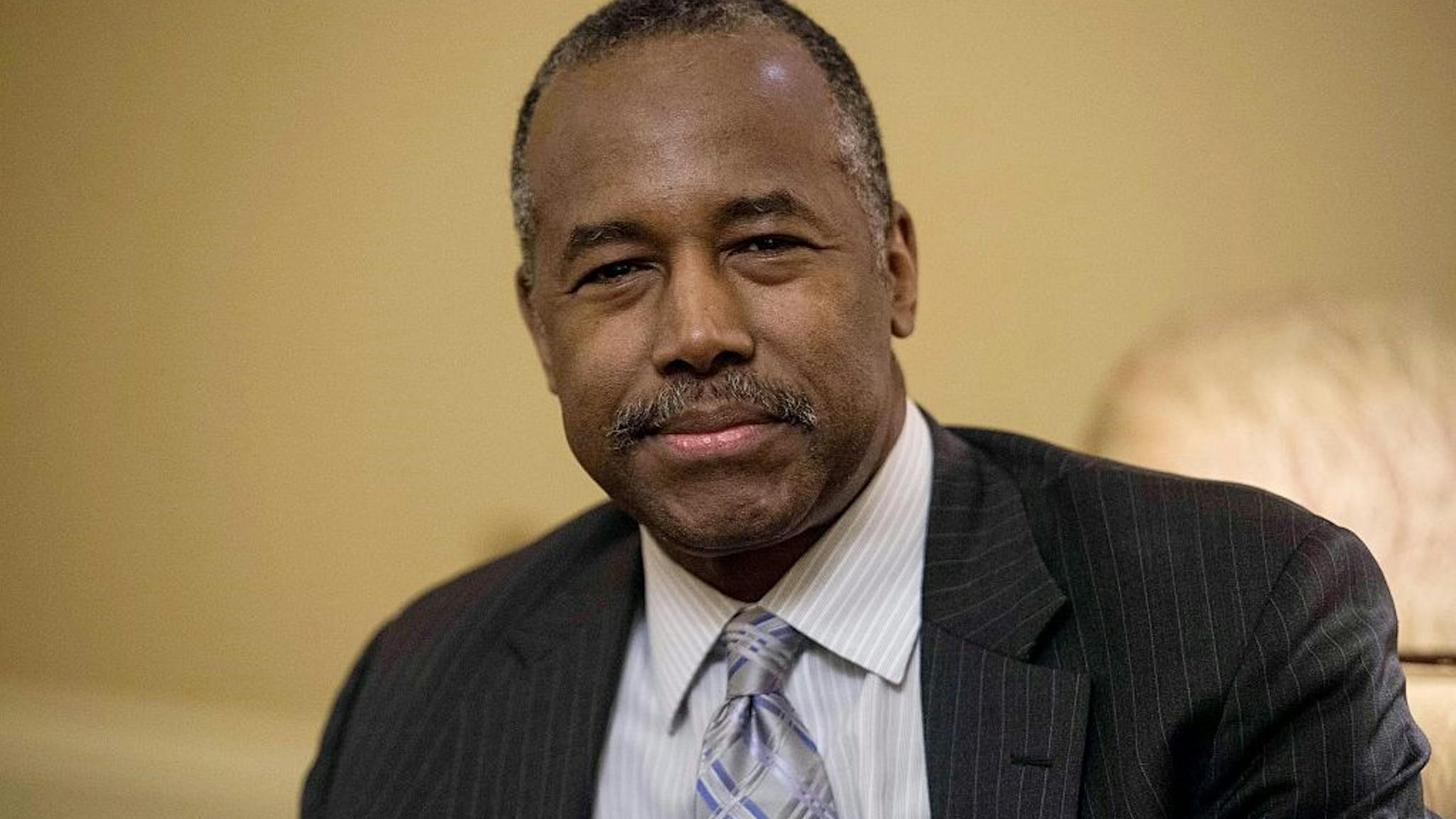 US-POLITICS-MCCONNELL-CARSON US Housing and Urban Development (HUD) Secretary nominee Ben Carson poses for photos before a meeting with Senate Majority Leader Mitch McConnell at the Capitol in Washington, DC, on December 7, 2016.