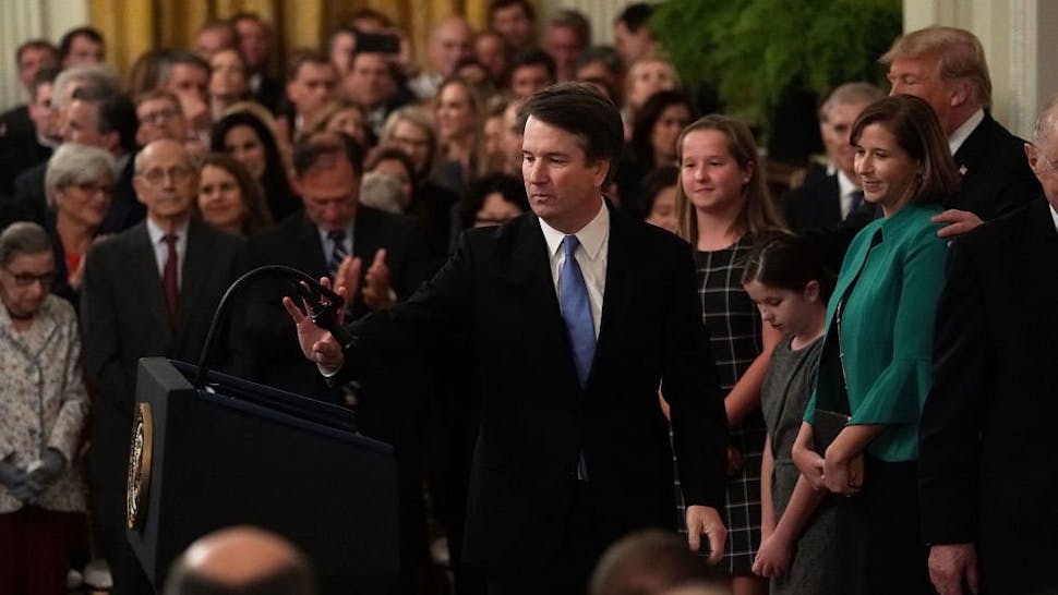 Brett Kavanaugh U.S. Supreme Court Justice Brett Kavanaugh (C) takes the podium as his wife Ashley (2nd R), daughters Liza (4th R) and Margaret (3rd R), and President Donald Trump (R) look on during a ceremonial swearing in at the White House October 8, 2018.