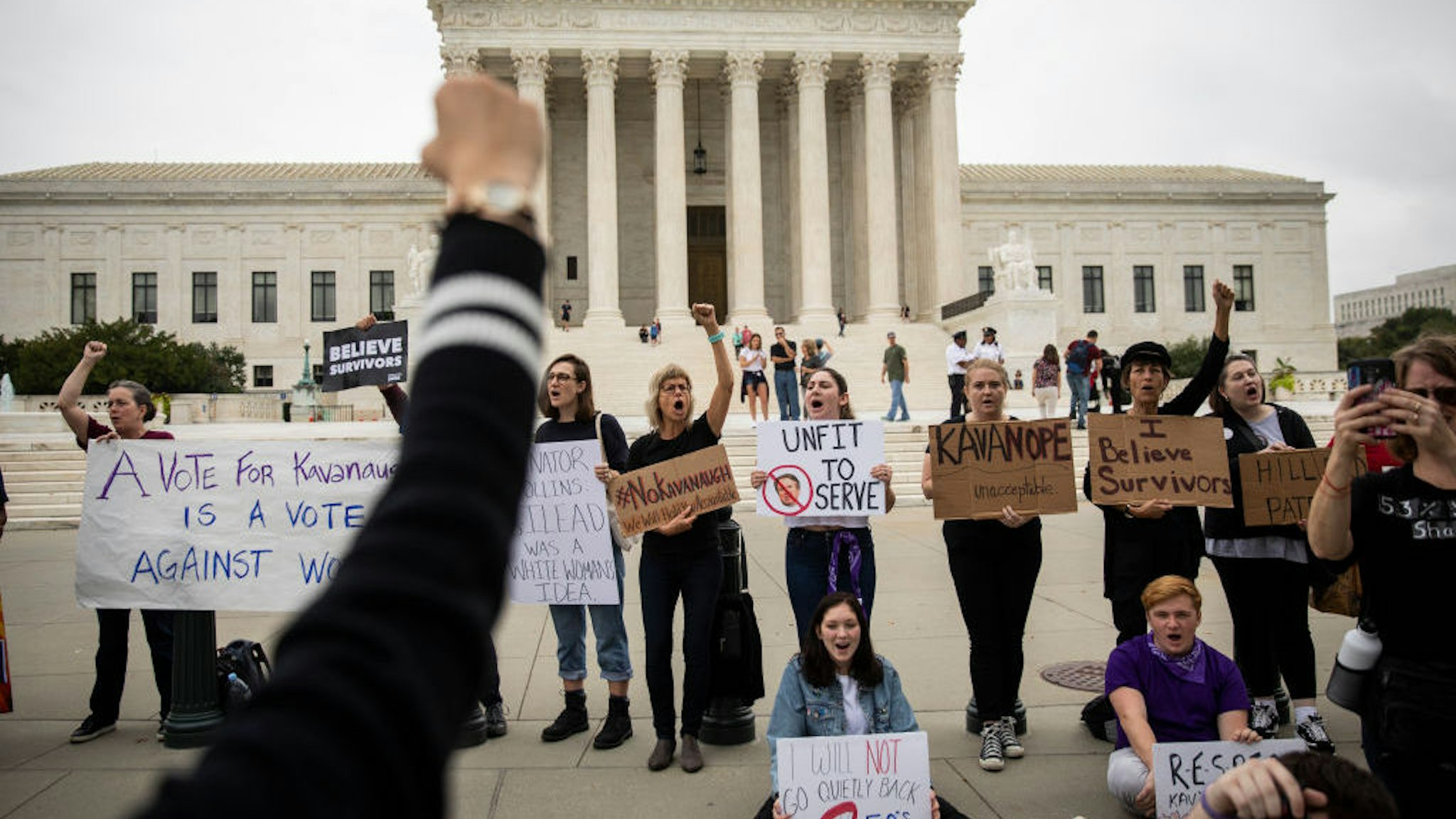 WASHINGTON, DC - OCTOBER 6: Protesters rally against the confirmation of Supreme Court nominee Judge Brett Kavanaugh, outside of the Supreme Court, October 6, 2018 in Washington, DC. The Senate is set to hold a final vote Saturday evening to confirm the nomination of Judge Brett Kavanaugh to the U.S. Supreme Court.