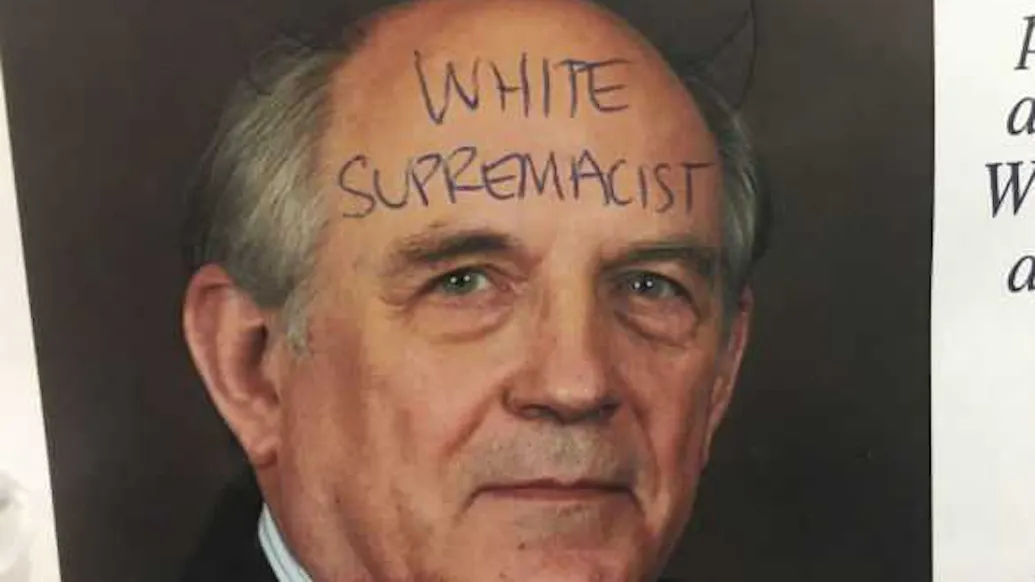Students At Columbia Plaster Devil Horns On Charles Murray Posters