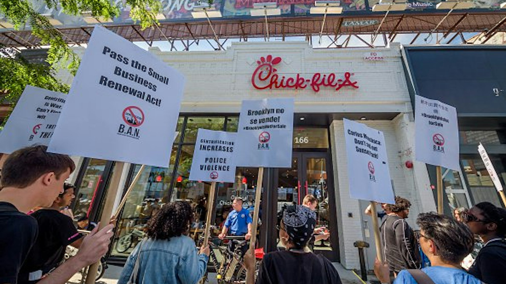 Protesters targeted Chick-Fil-A for their alleged homophobe stance - some of the banners accused Chick-Fil-A of being anti gay.