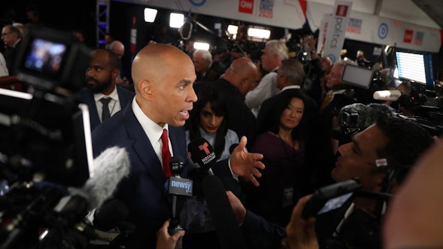 Democratic presidential candidate Sen. Cory Booker (D-NJ) speaks to the media in the spin room after the Democratic Presidential Debate at the Fox Theatre July 31, 2019 in Detroit, Michigan.