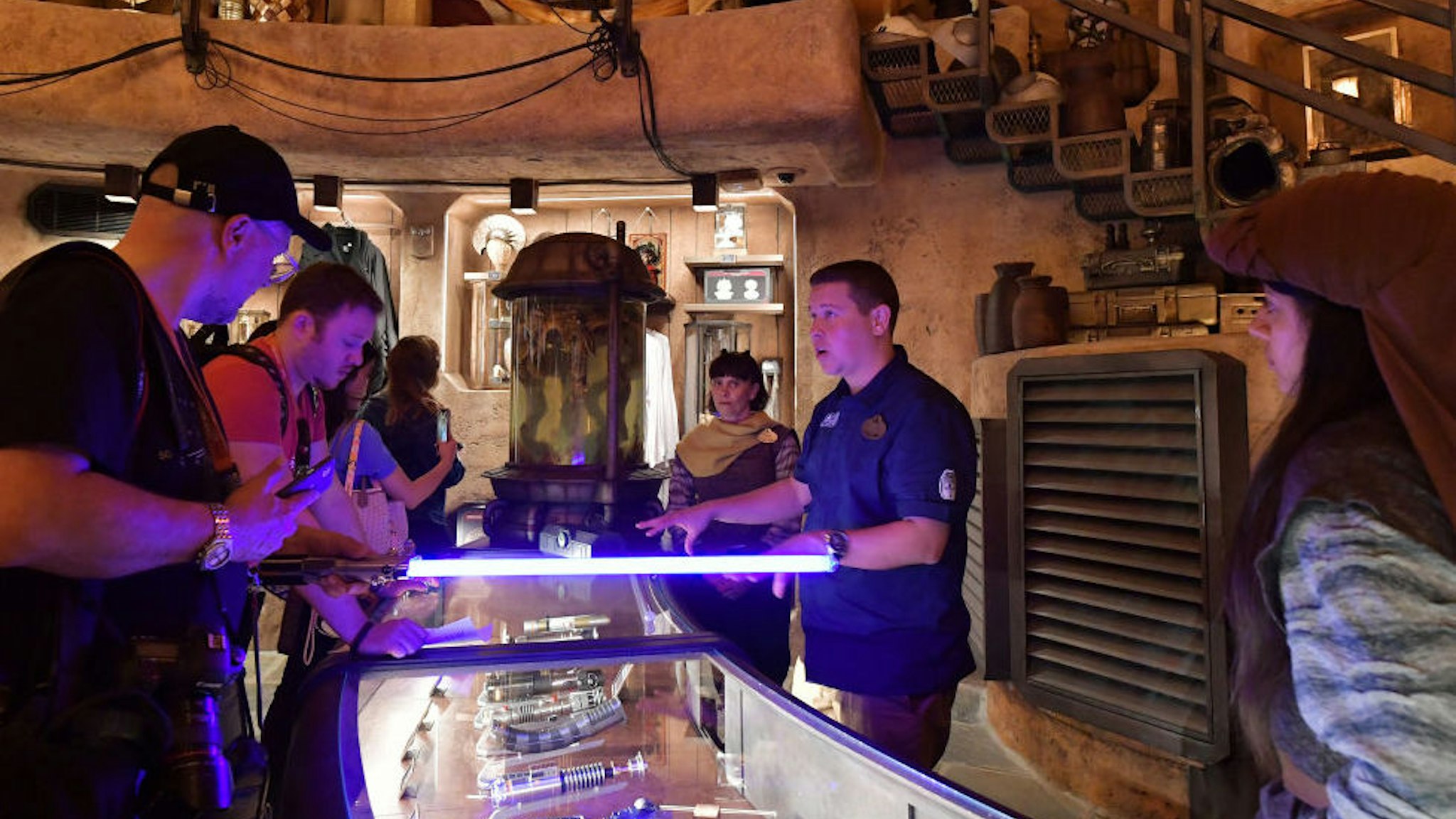 Visitors Build Customized Lightsabers At Disneyland.