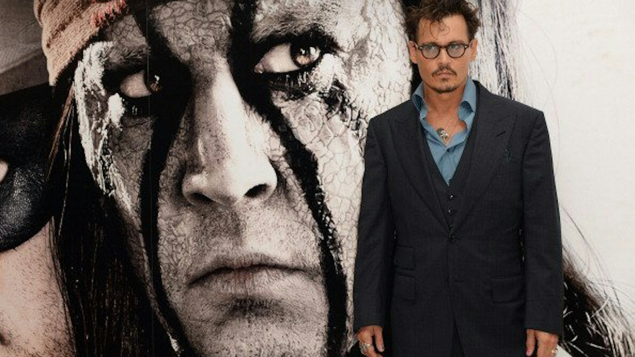 Johnny Depp attends the UK premiere of 'The Lone Ranger' at The Odeon Leicester Square on July 21, 2013 in London, England.