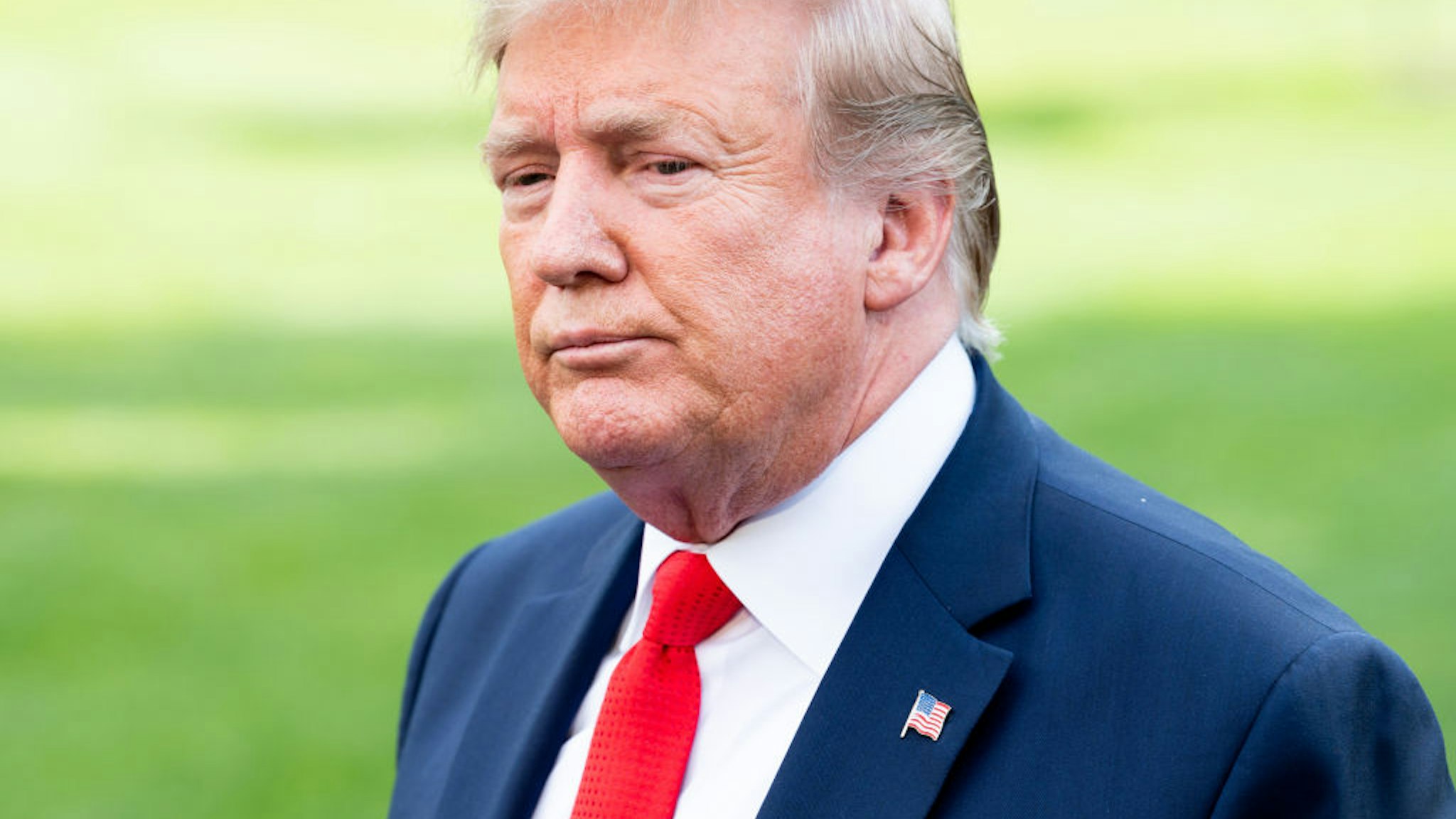 WASHINGTON, DC, UNITED STATES - 2019/07/24: President Donald Trump talking with the press as he leaves the White House in Washington, DC. (Photo by Michael Brochstein/SOPA Images/LightRocket via Getty Images)