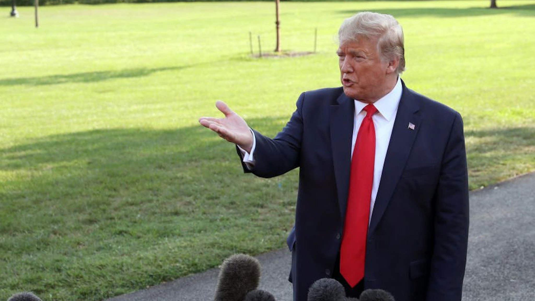 U.S. President Donald Trump speaks to the media before departing from the White House on September 16, 2019 in Washington, DC.
