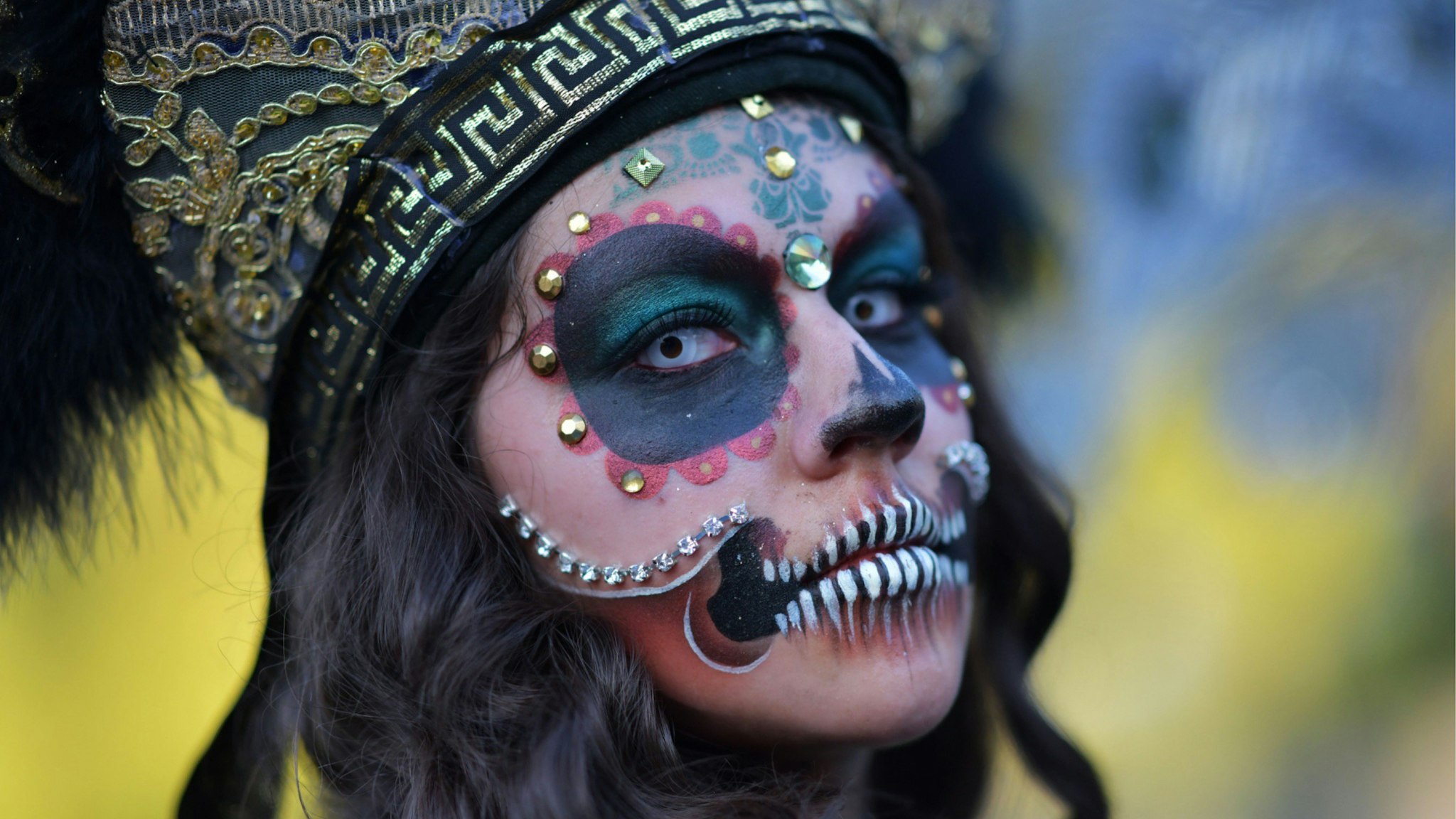 A woman in costume poses as she attends Hollywood Forever Cemetery's 19th annual Dia De Los Muertos event on October 27, 2018.