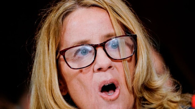Christine Blasey Ford testifies before the US Senate Judiciary Committee on Capitol Hill in Washington, DC, on September 27, 2018. - Blasey Ford told senators Thursday that she remains "100 percent" certain that Brett Kavanaugh, President Donald Trump's n