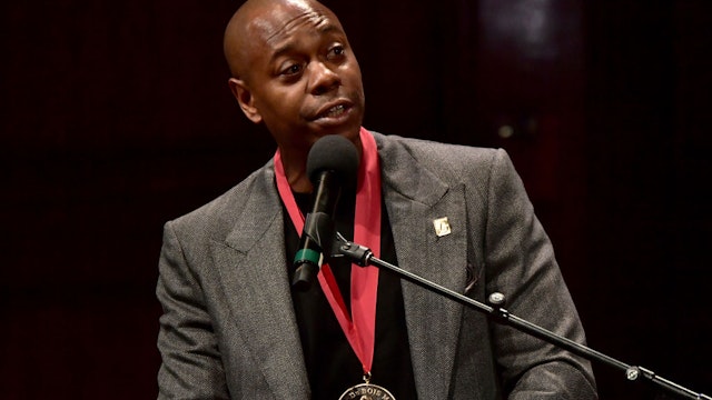 Dave Chappelle on stage at the W.E.B. Du Bois Medal Award Ceremony at Harvard University on October 11, 2018 in Cambridge, Massachusetts.