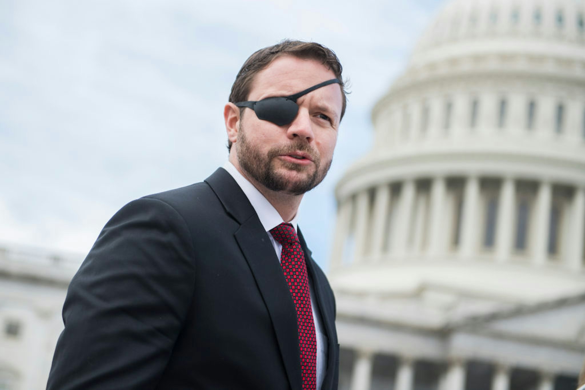 Rep.-elect Dan Crenshaw, R-Texas, is seen after the freshman class photo on the East Front of the Capitol on November 14, 2018. (Photo By Tom Williams/CQ Roll Call)
