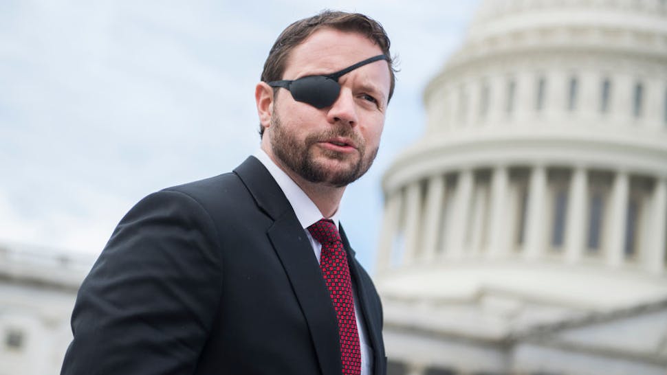 Dan Crenshaw Rep.-elect Dan Crenshaw, R-Texas, is seen after the freshman class photo on the East Front of the Capitol on November 14, 2018. (Photo By Tom Williams/CQ Roll Call)