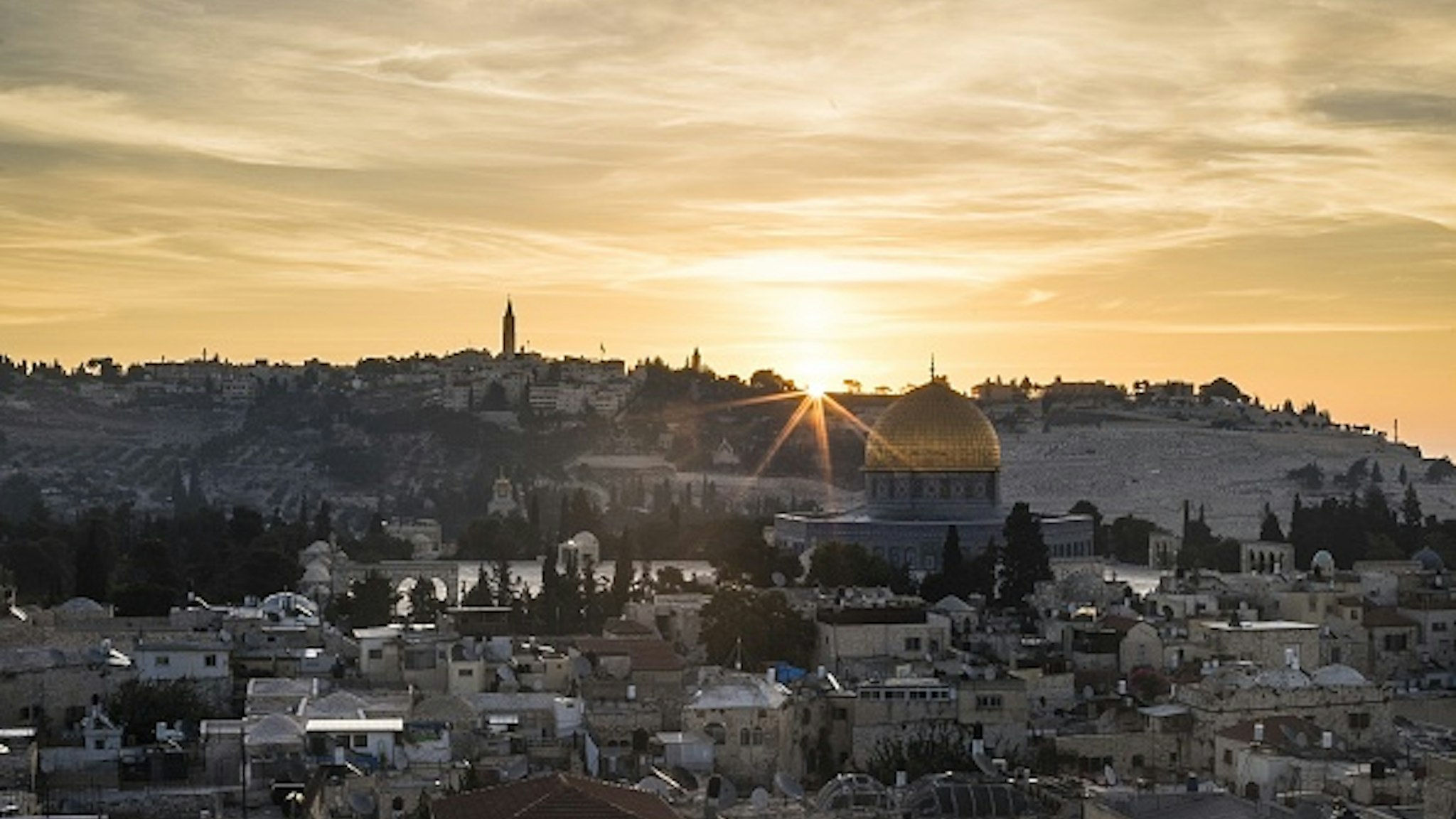 JERUSALEM - (ARCHIVE) : A photo taken by Anadolu Agency photojournalist Mostafa Alkharouf on October 05, 2018 shows Haram al-Sharif (Temple Mount), including Qubbat al-Sakhrah (Dome of the Rock) of Al-Aqsa Mosque Compound during the sunrise in Jerusalem. The Israeli authorities are trying to deport Anadolu Agency photojournalist Mostafa Alkharouf (32), who lives in East Jerusalem, allegedly for not holding a residence permit. Kharouf, has been detained by Israeli forces for 33 days at Israel's Givon Prison. He is being forced to sign the necessary documents to be deported from East Jerusalem to Jordan.