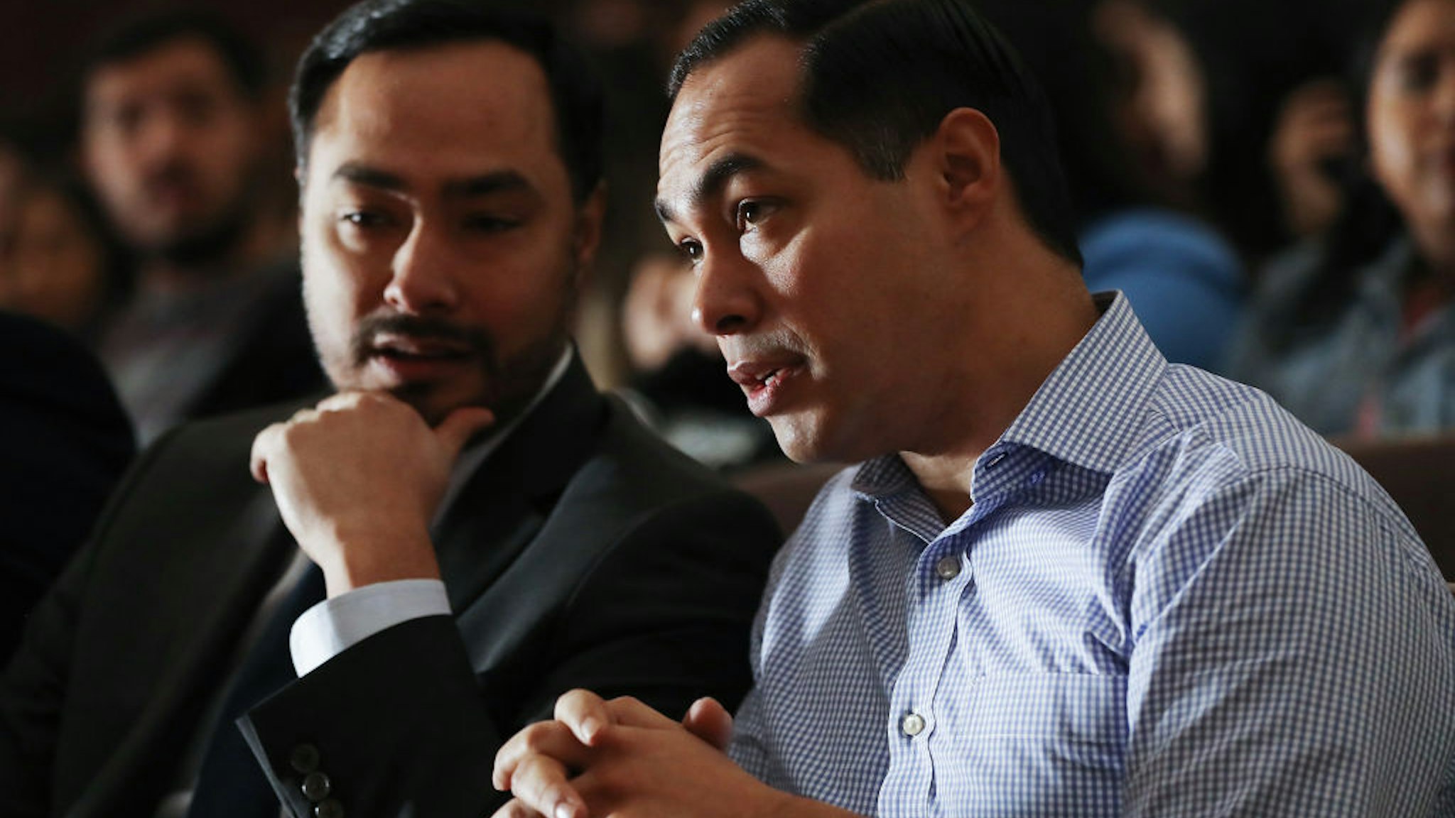BELL GARDENS, CALIFORNIA - MARCH 04: Democratic presidential candidate Julian Castro (R) and his twin brother U.S. Rep. Joaquin Castro (D-TX) sit at a campaign appearance at Bell Gardens High School, in Los Angeles county, on March 4, 2019 in Bell Gardens, California. Castro, who served as Secretary of Housing and Urban Development (HUD) under President Barack Obama, is aiming to become the country's first Latino president. (