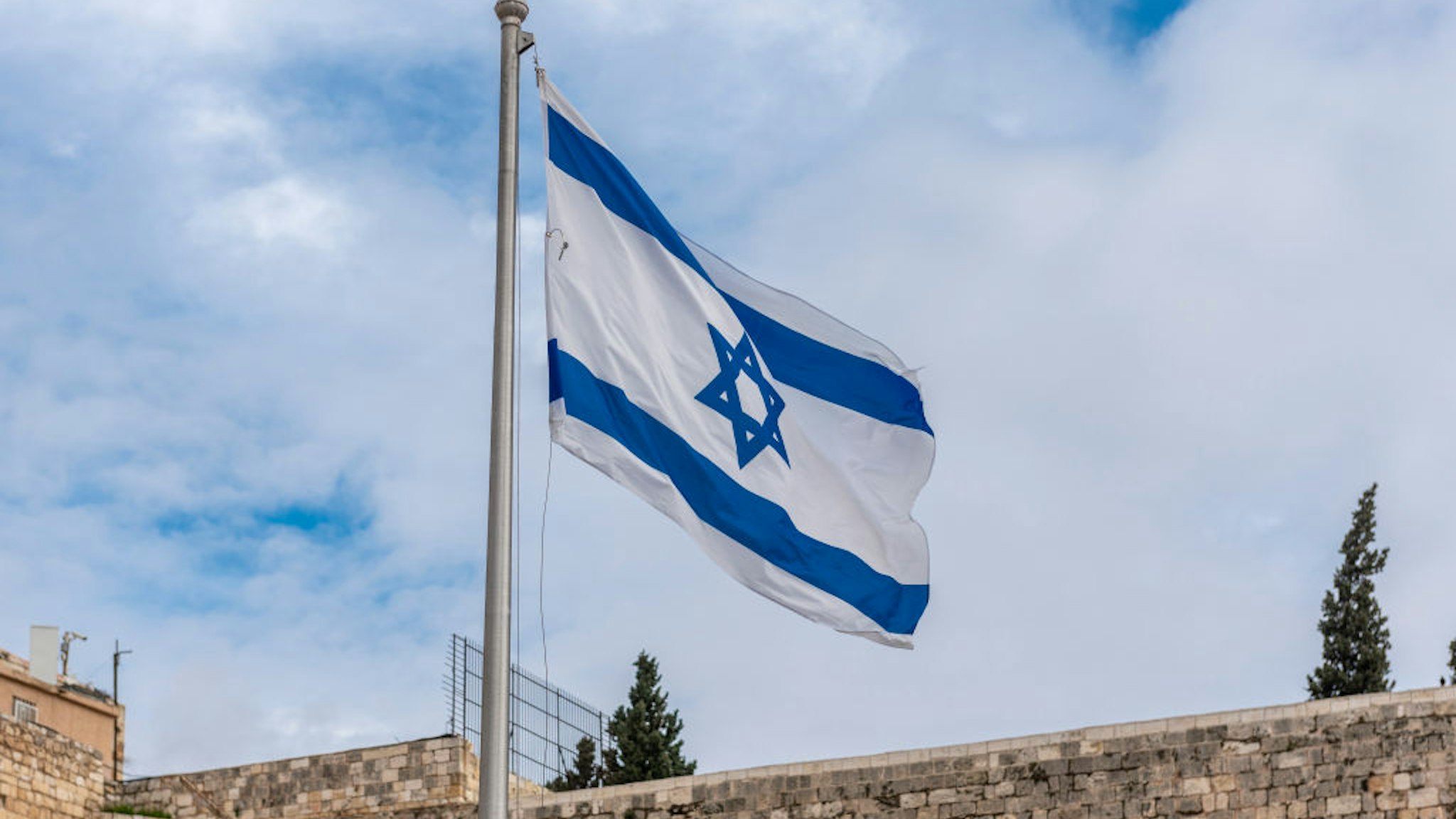Israel, Jerusalem - 31 December 2018: Israeli flag at the Western wall
