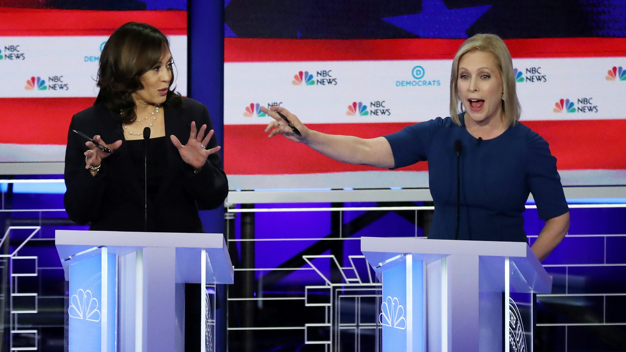 MIAMI, FLORIDA - JUNE 27: Democratic presidential candidate Sen. Kamala Harris (L) (D-CA) and Sen. Kirsten Gillibrand (D-NY) speak during the second night of the first Democratic presidential debate on June 27, 2019 in Miami, Florida. A field of 20 Democratic presidential candidates was split into two groups of 10 for the first debate of the 2020 election, taking place over two nights at Knight Concert Hall of the Adrienne Arsht Center for the Performing Arts of Miami-Dade County, hosted by NBC News, MSNBC, and Telemundo.
