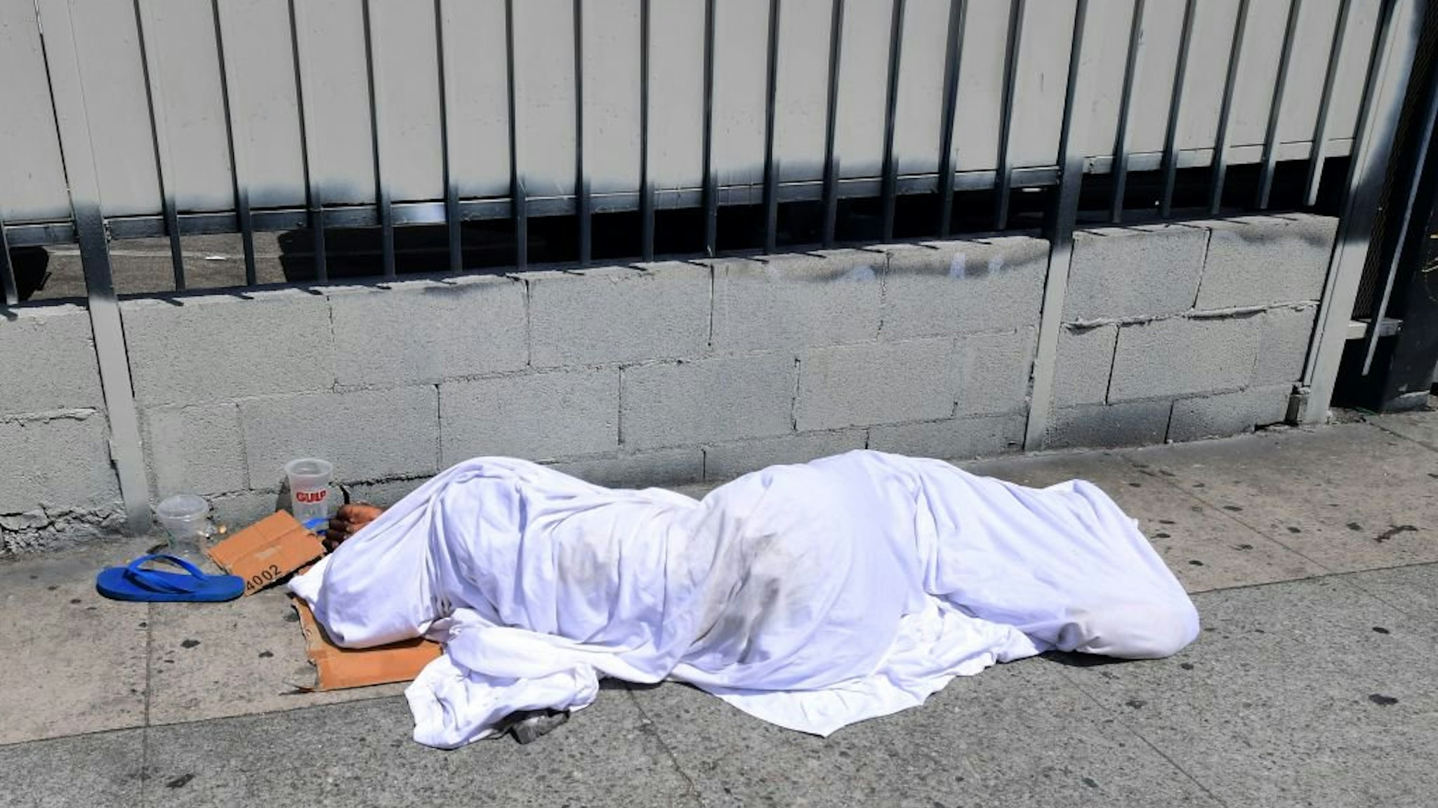 Homeless person sleeping in the street