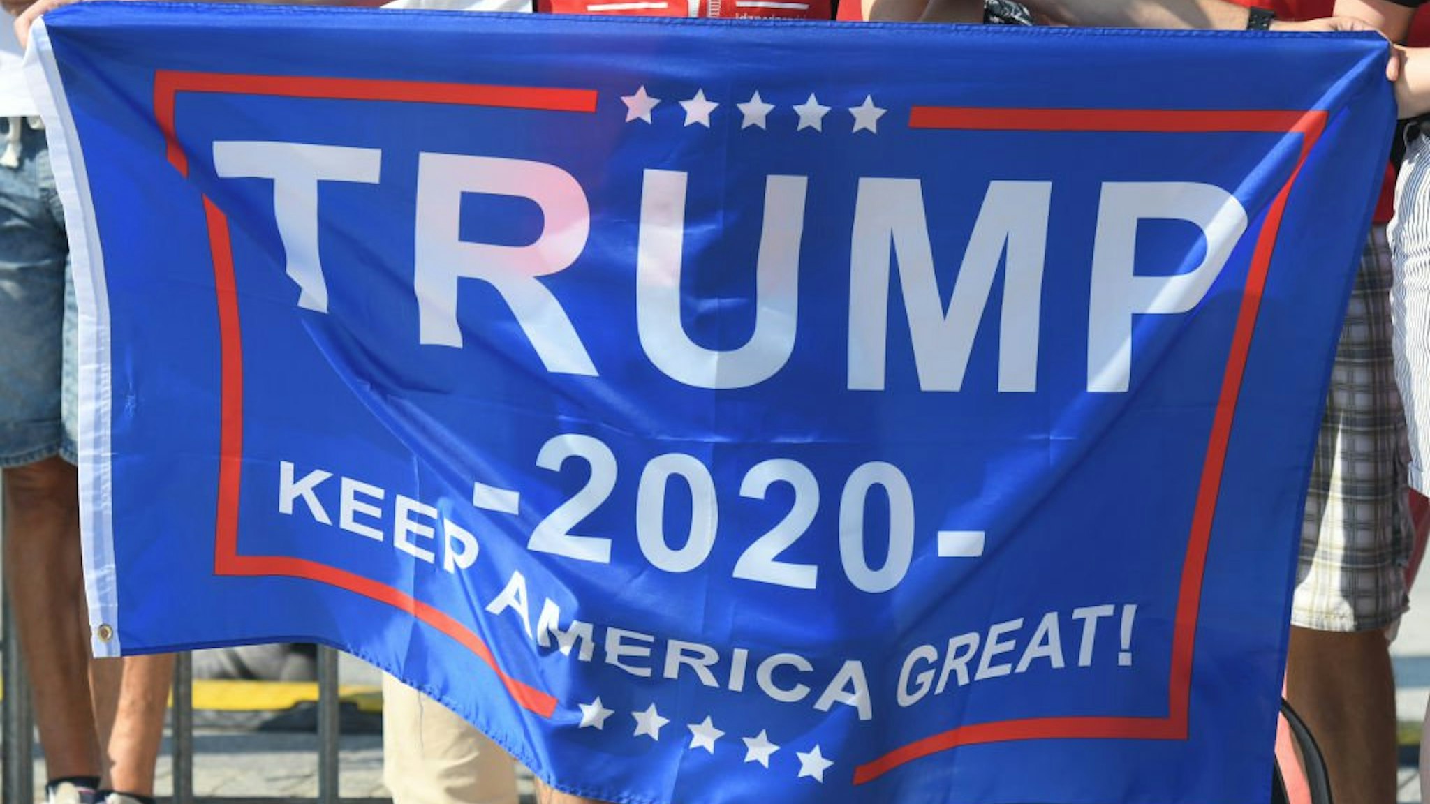 President Trump and USA supporter holds 'Trump 2020 - Keep America Great' banner, ahead of the ceremony commemorating the 80th anniversary of the outbreak of World War II. On Sunday, September 1, 2019, in Warsaw, Poland.