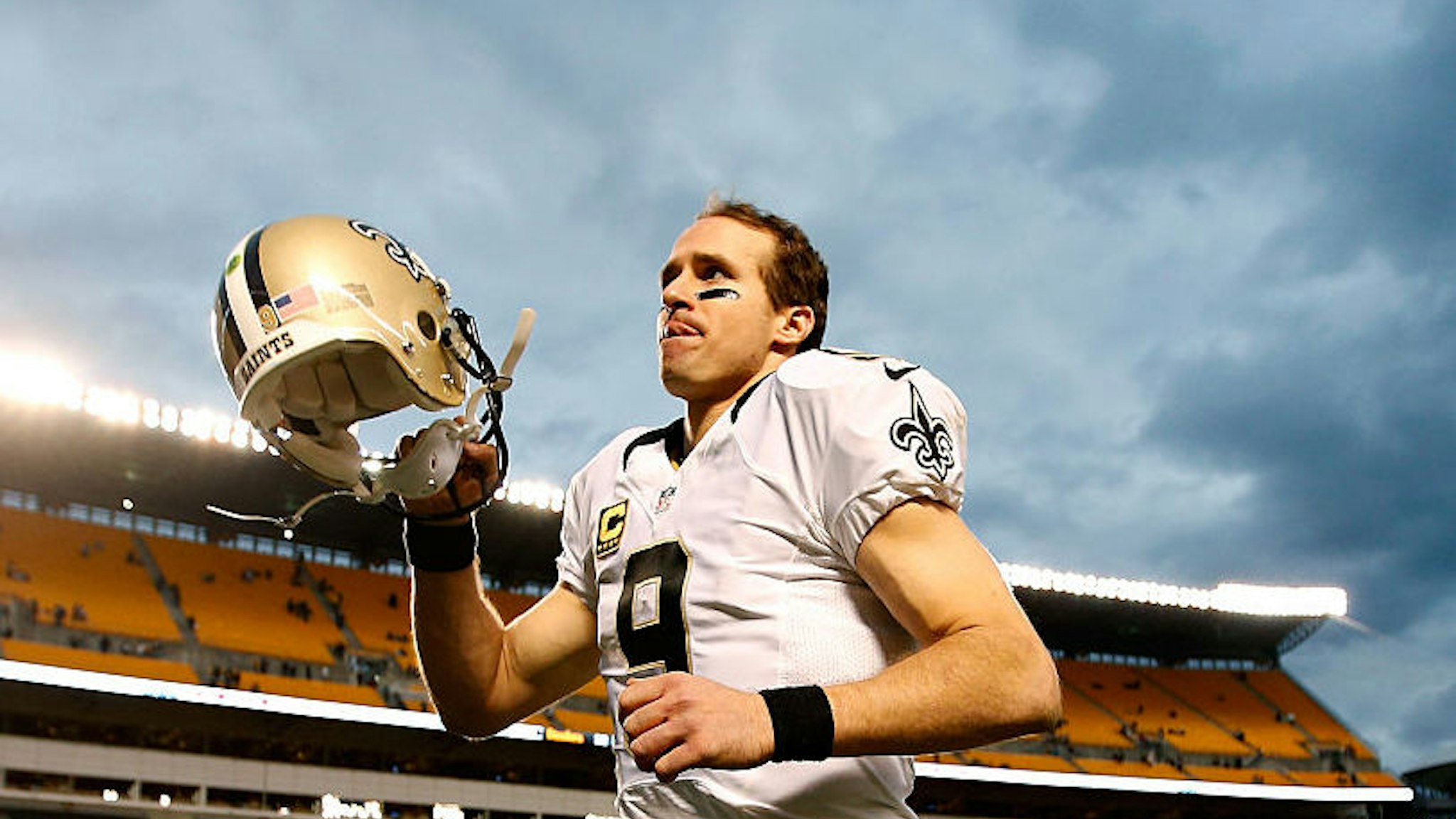 PITTSBURGH, PA - NOVEMBER 30: Drew Brees #9 of the New Orleans Saints runs off the field after a 35-32 win over the New Orleans Saints at Heinz Field on November 30, 2014 in Pittsburgh, Pennsylvania.