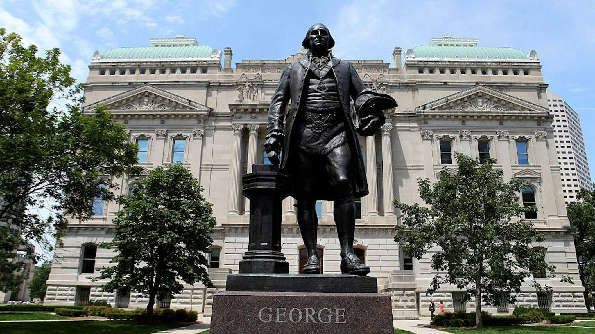 INDIANAPOLIS - JULY 16: George Washington statue stands outside the Indiana State Capitol Building on July 16, 2015 in Indianapolis, Indiana.
