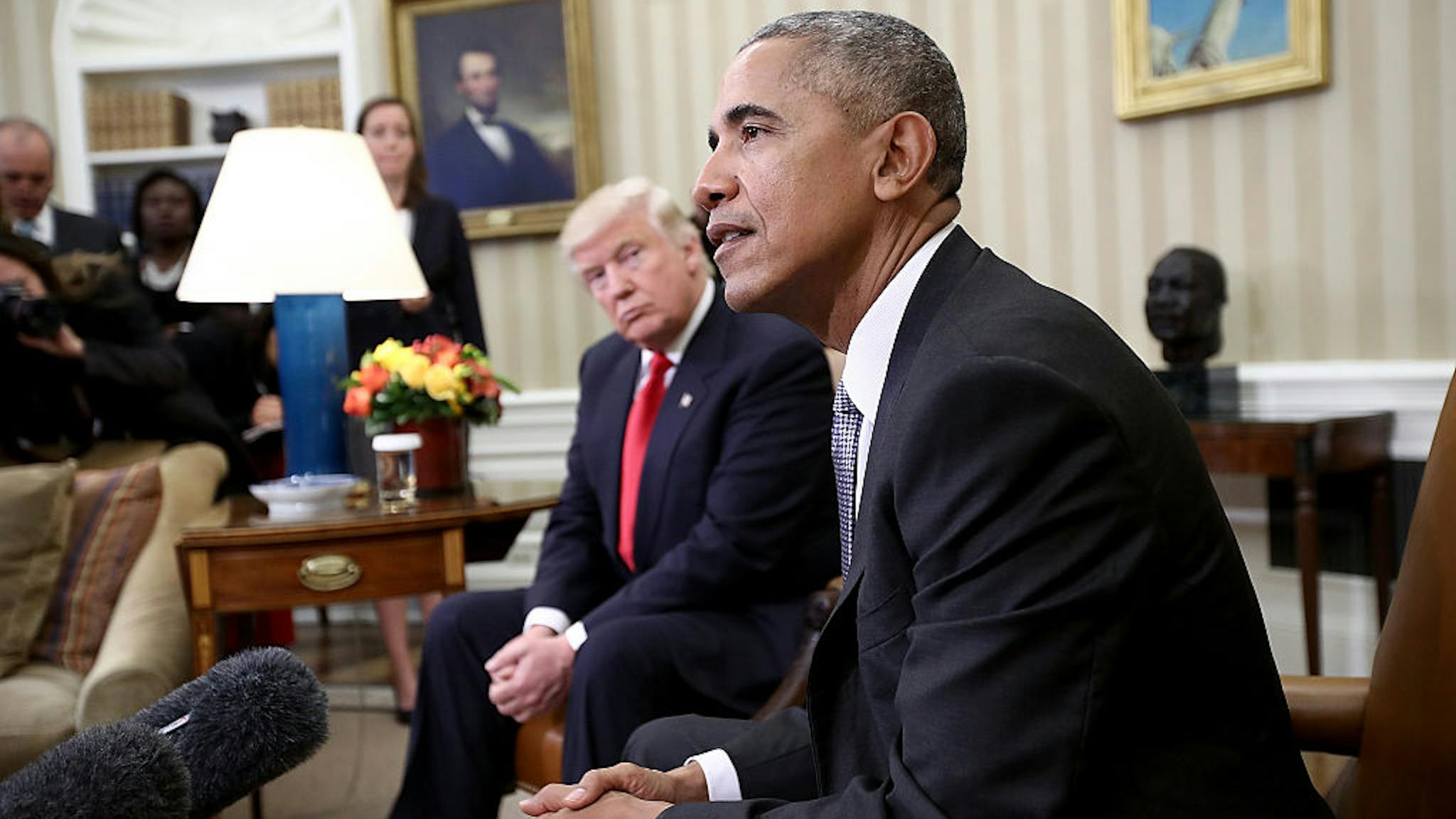 President Obama Meets With President-Elect Donald Trump In The Oval Office Of White House President-elect Donald Trump (L) listens as U.S. President Barack Obama speaks during a meeting in the Oval Office November 10, 2016 in Washington, DC. Trump is scheduled to meet with members of the Republican leadership in Congress later today on Capitol Hill. (Photo by Win McNamee/Getty Images)
