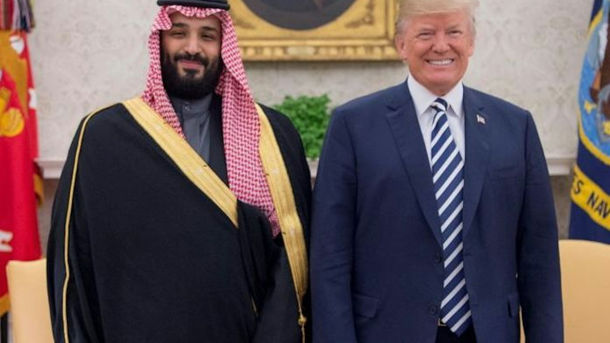 U.S. President Donald Trump (R) poses for a photo with Crown Prince Mohammed bin Salman Al Saud of Saudi Arabia