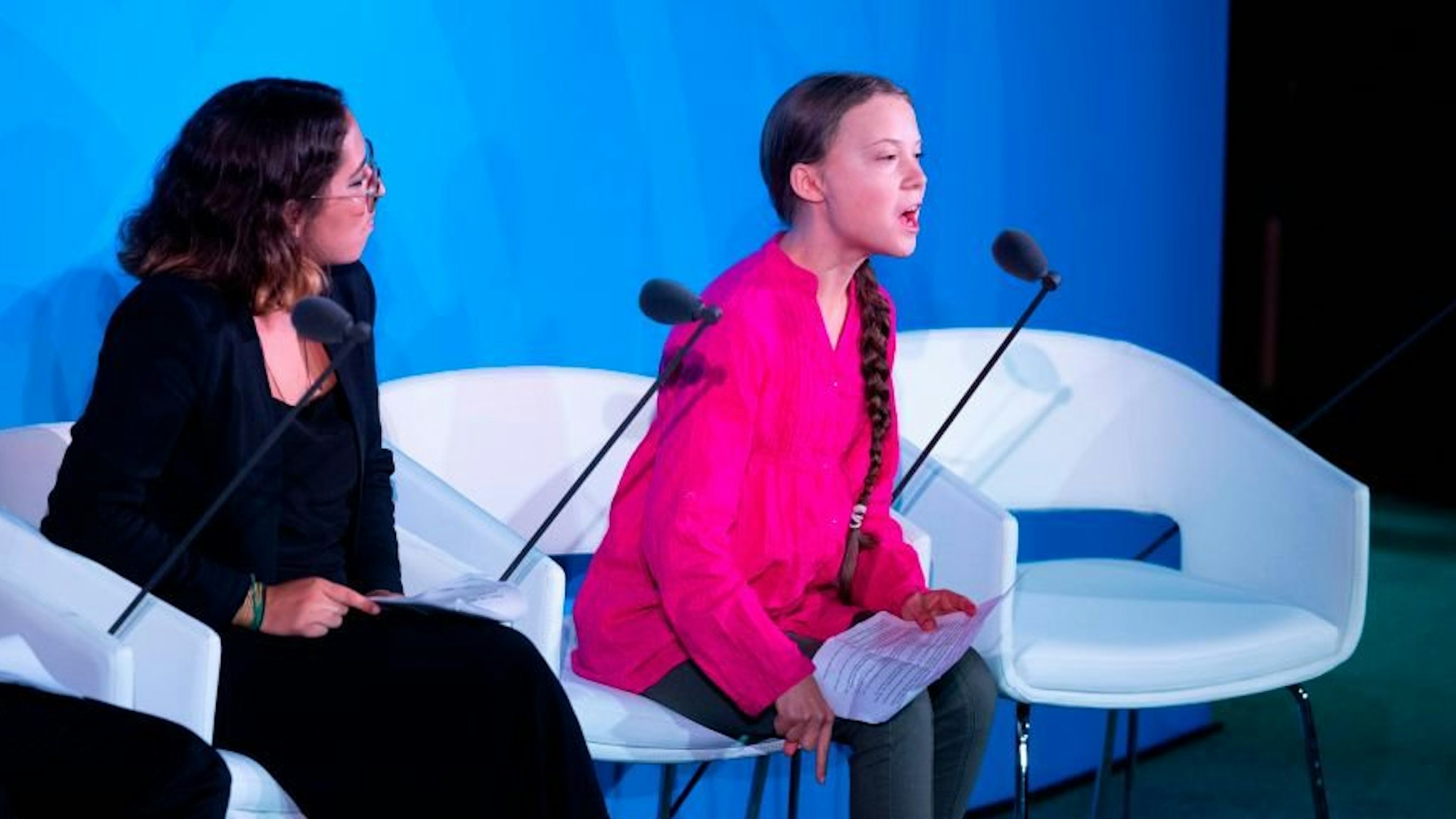 Youth Climate activist Greta Thunberg speaks next to Paloma Costa during the UN Climate Action Summit on September 23, 2019 at the United Nations Headquarters in New York City.