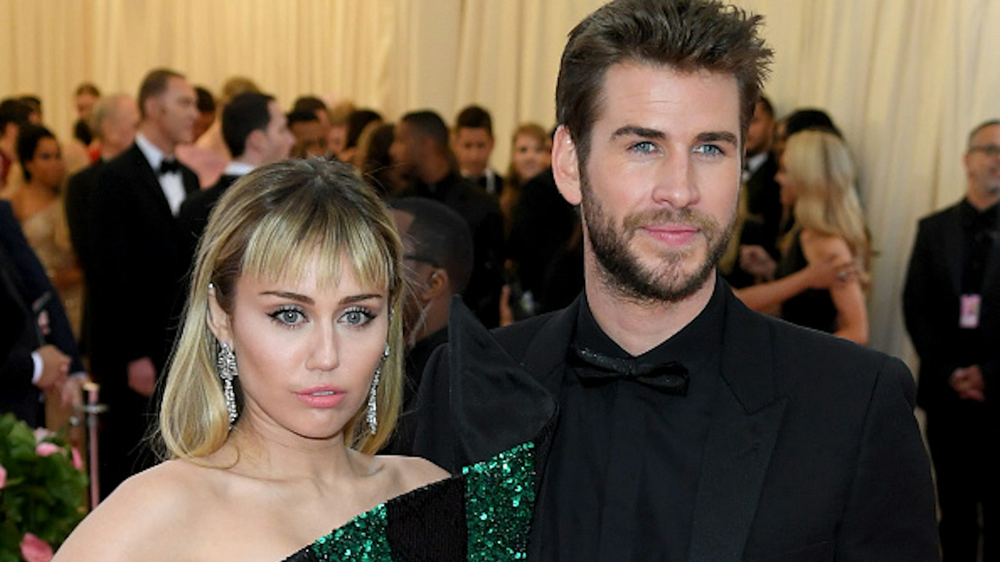 Miley Cyrus and Liam Hemsworth attend The 2019 Met Gala Celebrating Camp: Notes On Fashion at The Metropolitan Museum of Art on May 06, 2019 in New York City.