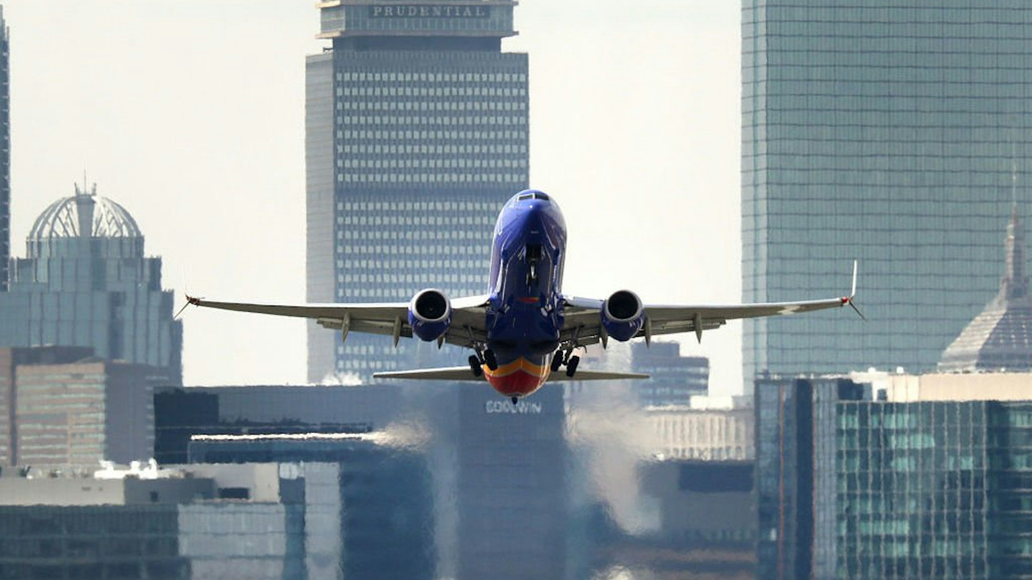 A Southwest Airlines flight takes off from Boston Logan International Airport as seen from Winthrop, MA on March 13, 2019.