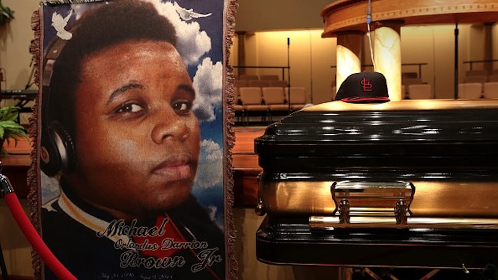 Funeral Held For Teen Shot To Death By Police In Ferguson, MO The casket of Michael Brown sits inside Friendly Temple Missionary Baptist Church awaiting the start of his funeral on August 25, 2014 in St. Louis Missouri.
