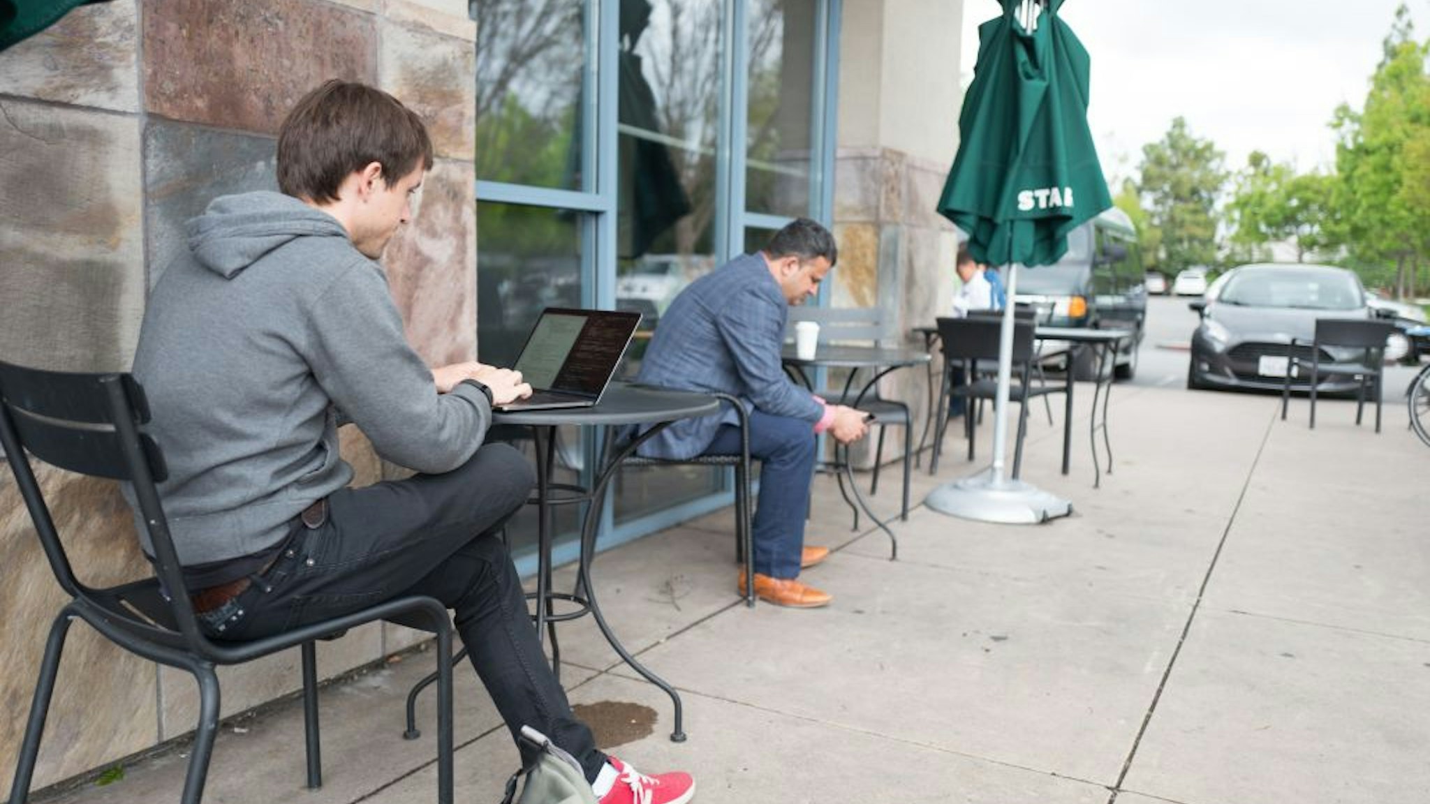 Millennial Outside A Coffee Shop
