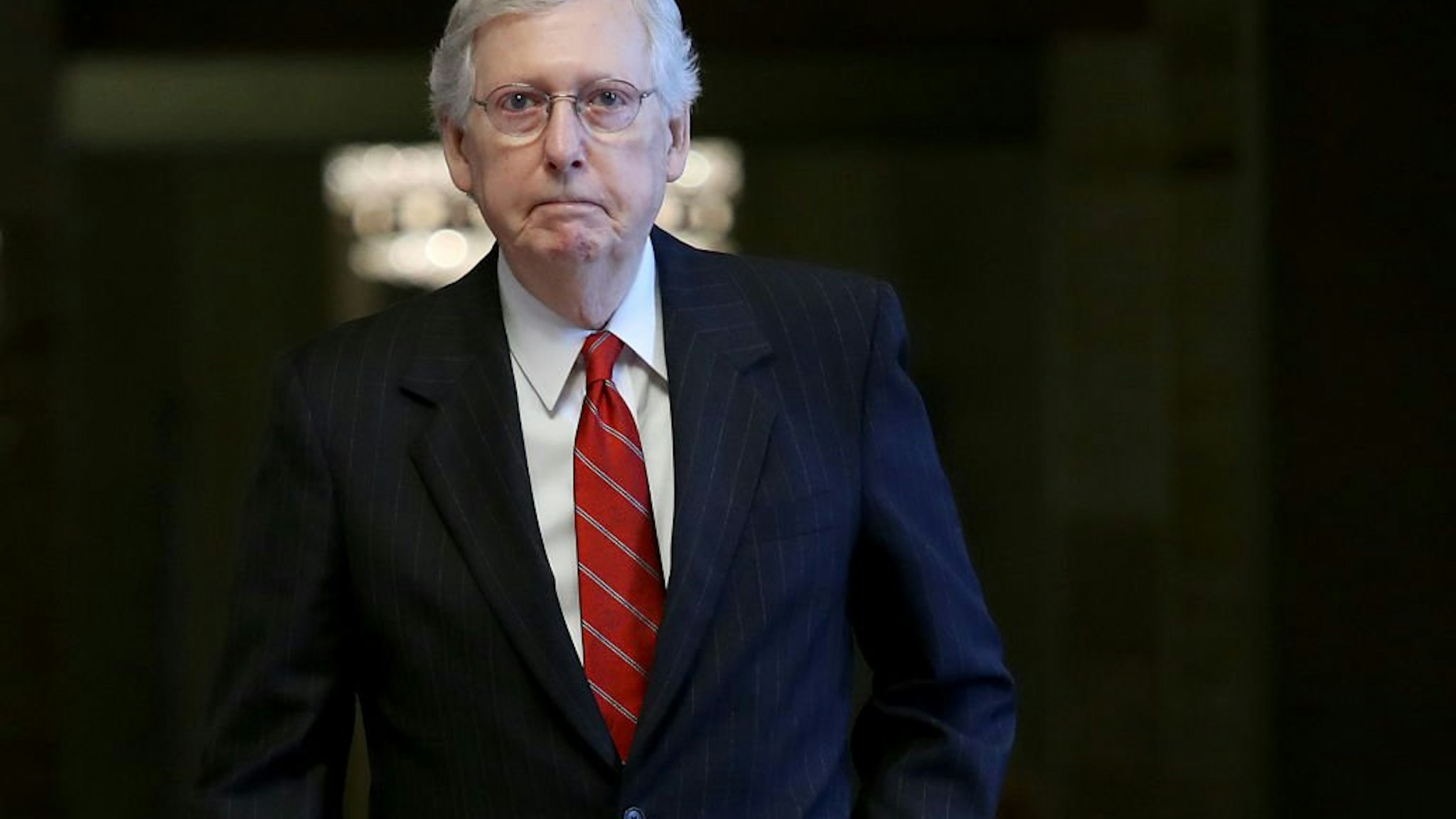 Senate Majority Leader Mitch McConnell (R-KY) walks to a series of votes at the U.S. Capitol