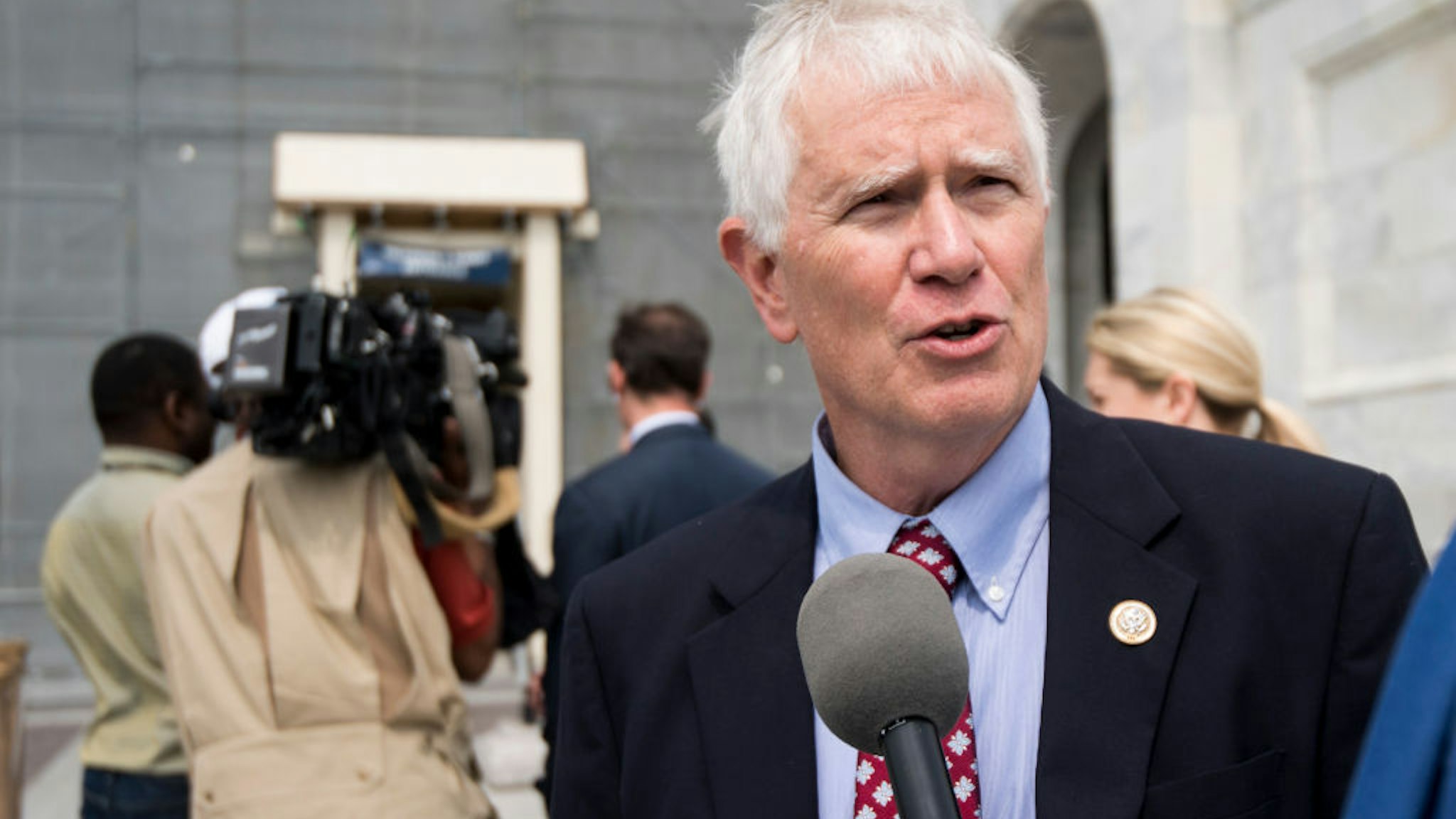 Rep. Mo Brooks, R-Ala., speaks with a reporter as he leaves the Capitol after the final vote of the week