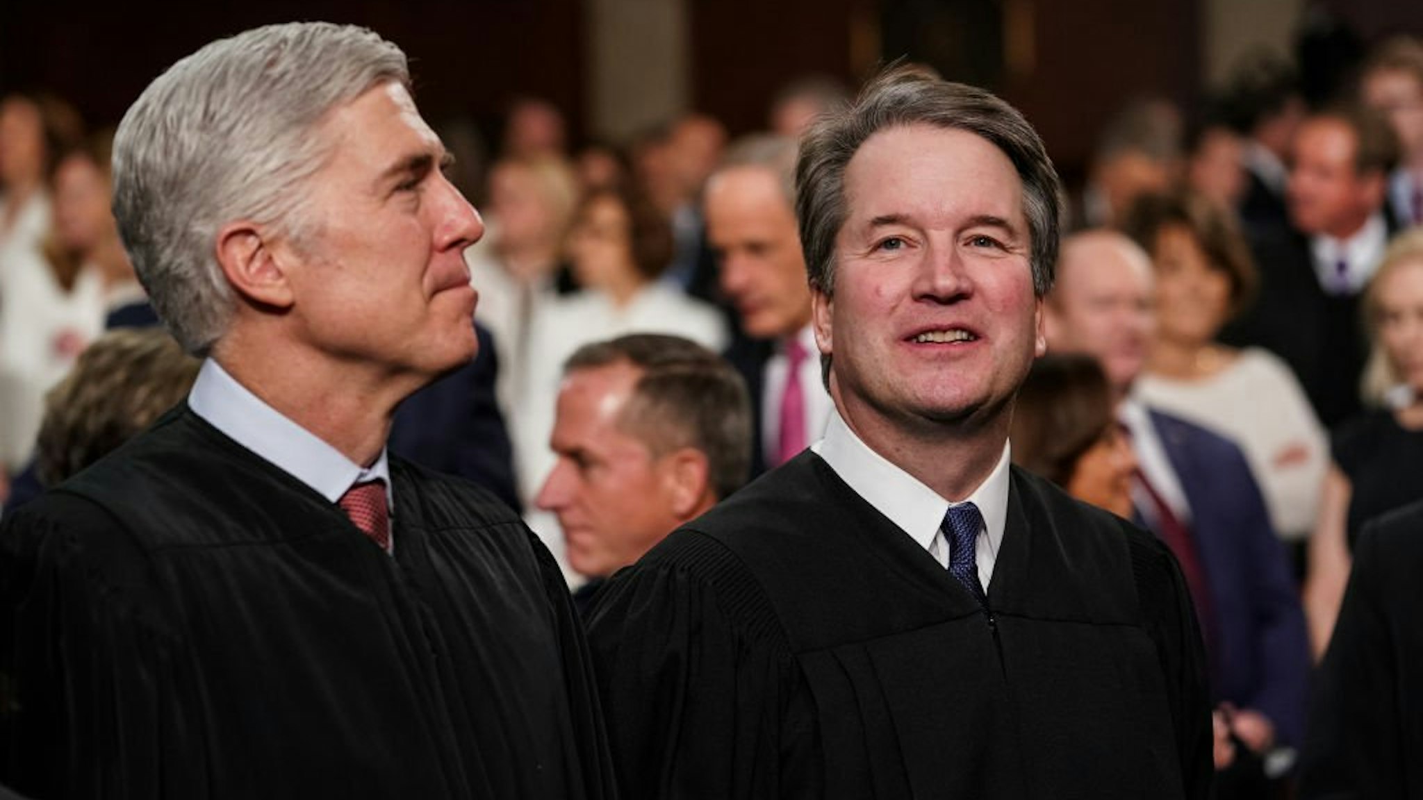 Supreme Court Justices Neil Gorsuch and Brett Kavanaugh attend the State of the Union address in the chamber of the U.S. House of Representatives at the U.S. Capitol Building on February 5, 2019 in Washington, DC.