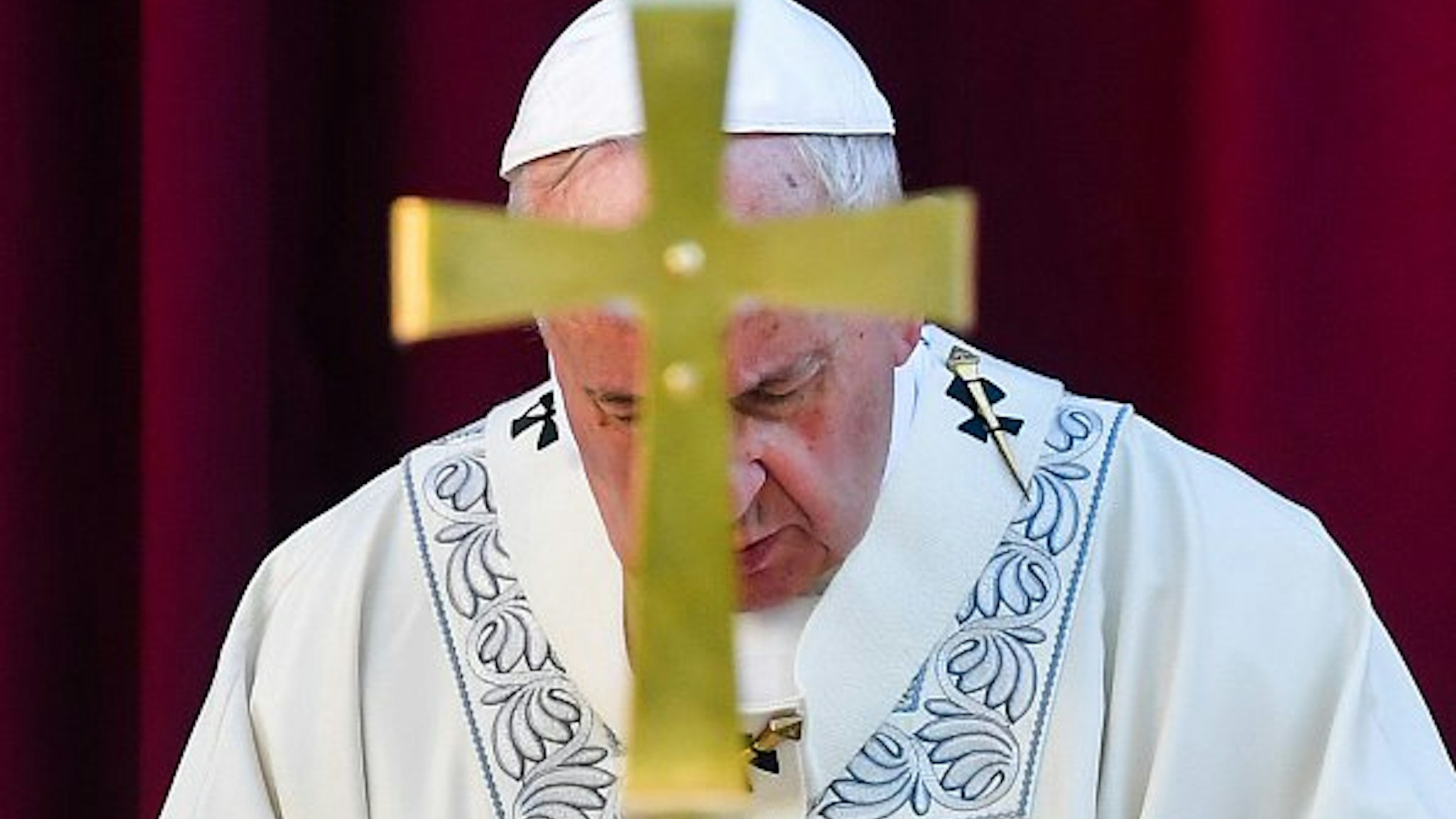 Pope Francis prays as he celebrates a mass for the Feast of Corpus Christi in the parish of Santa Maria Consolatrice in Romes Casal Bertone neighborhood on June 23, 2019.