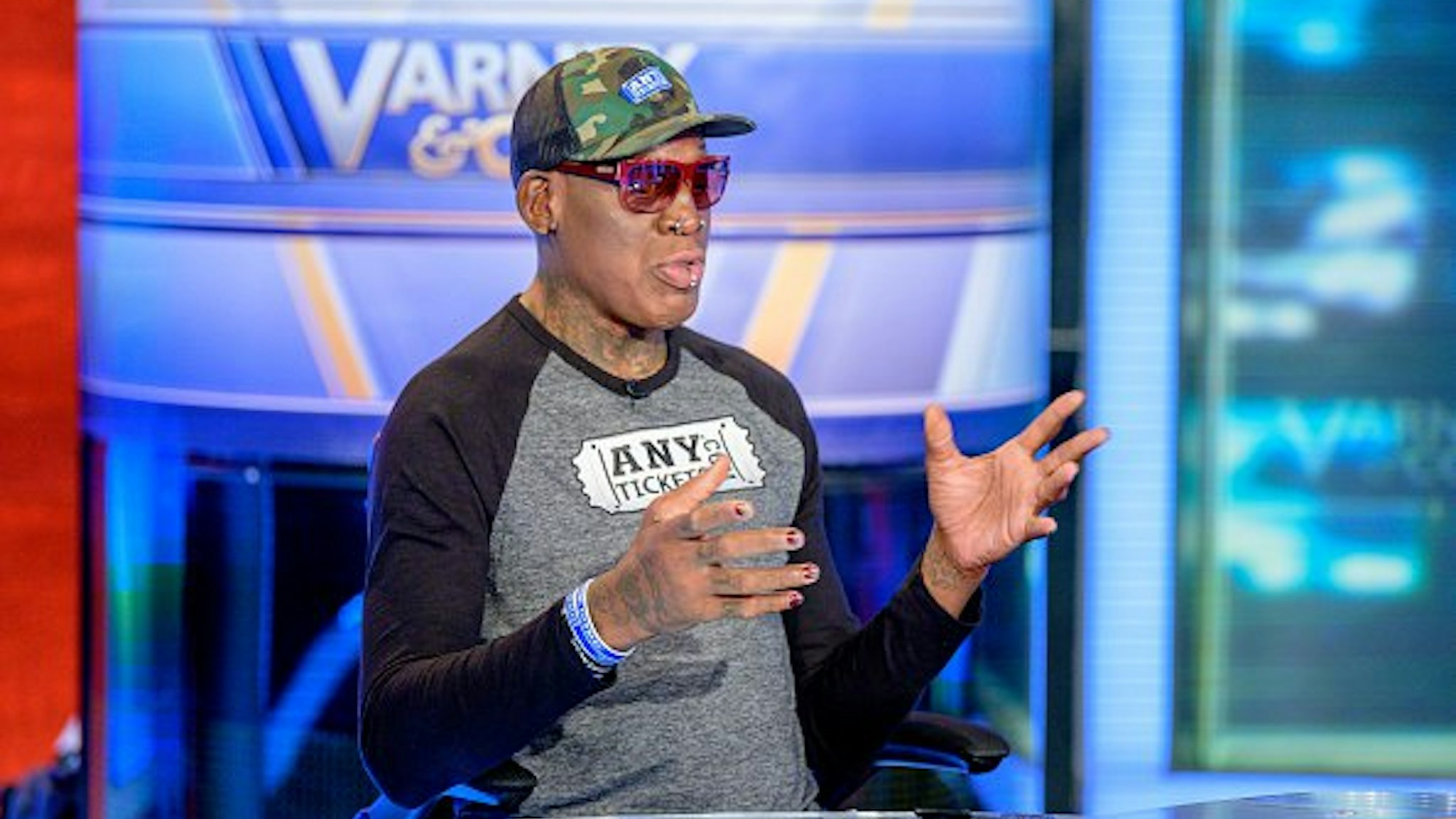 Former NBA Basketball player Dennis Rodman Visits "Varney & Co." with guest-host David Asman at Fox Business Network Studios on September 18, 2019 in New York City.